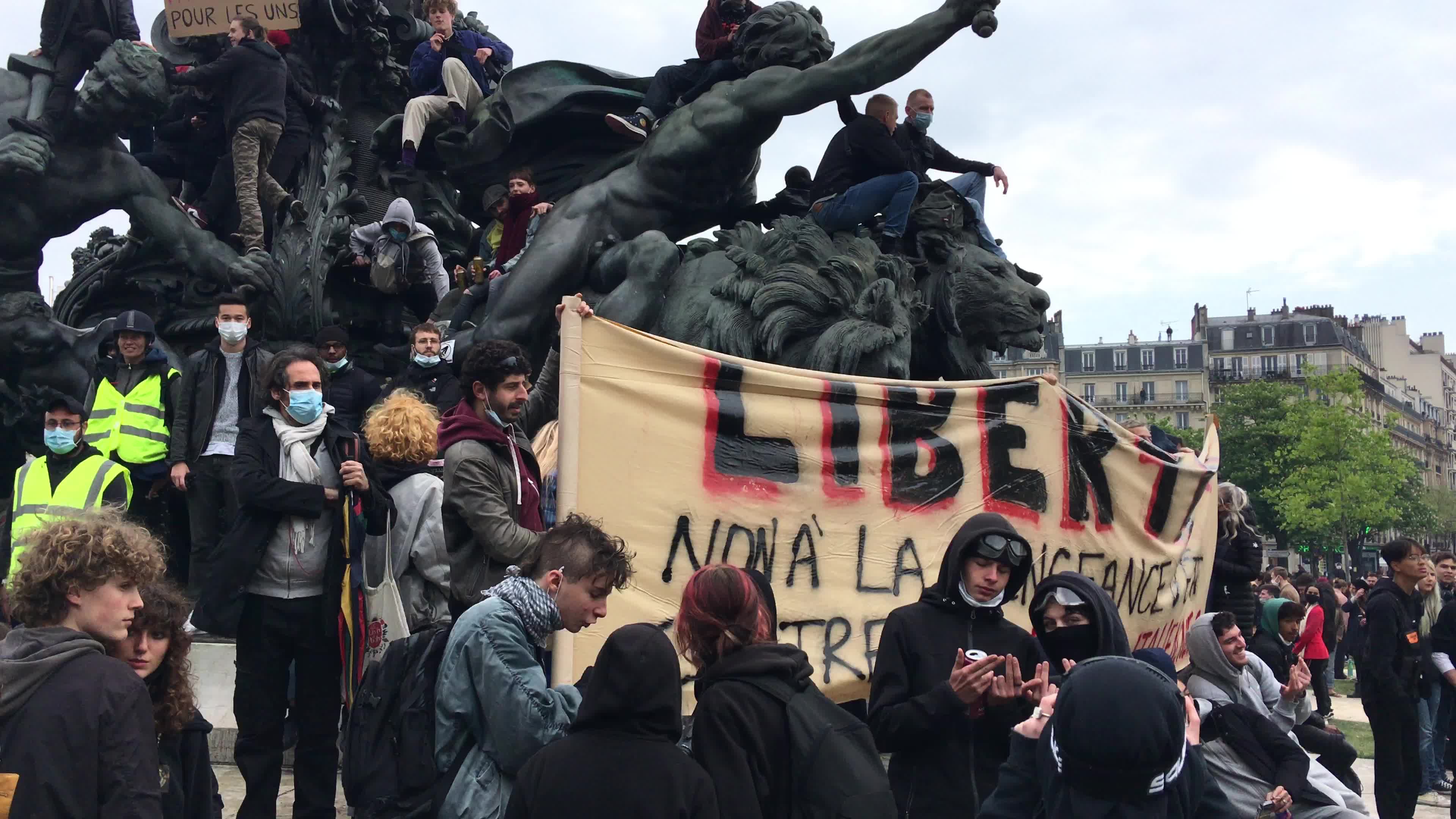 Protesters clash in Paris during the May Day