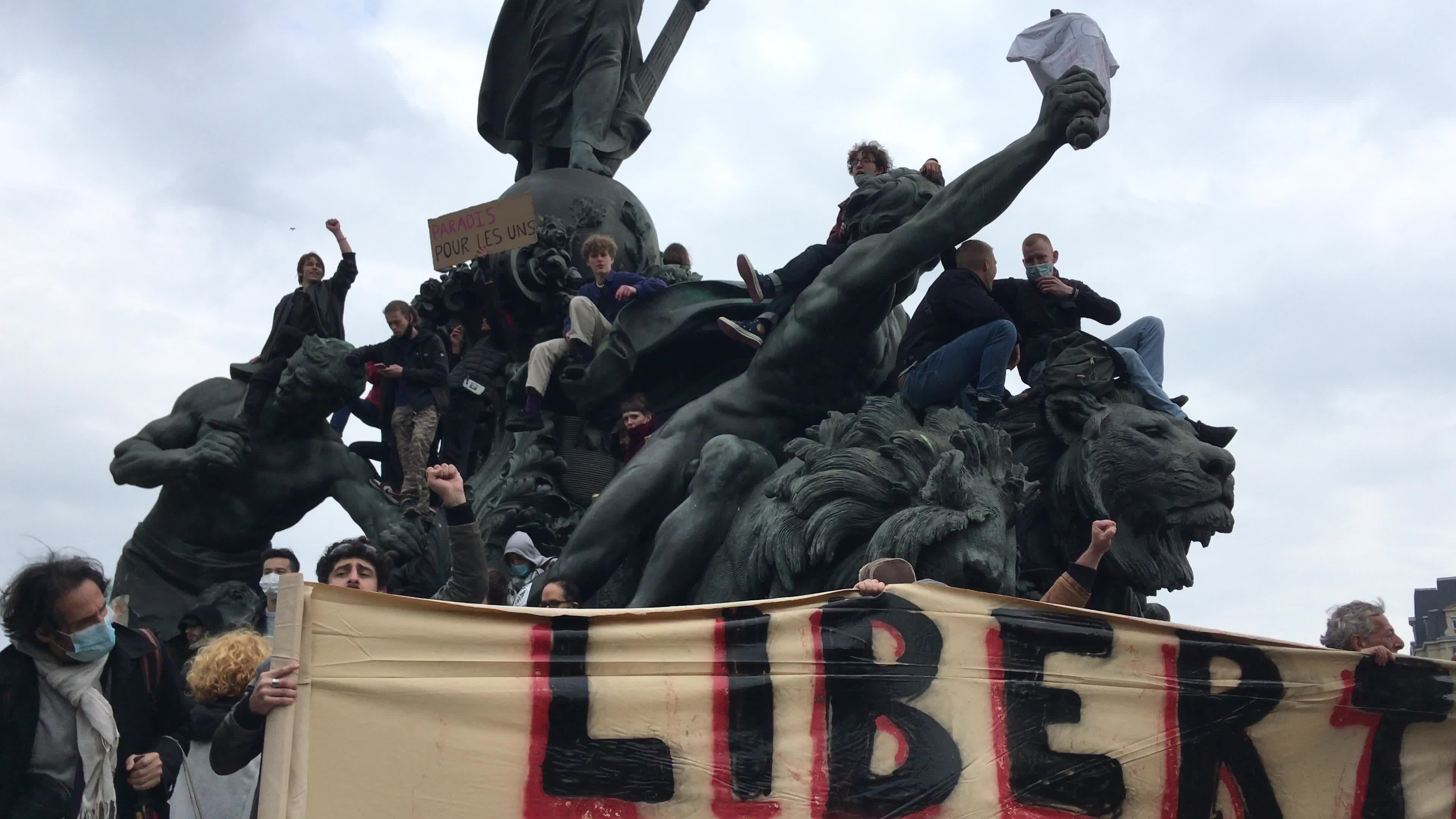 Protesters clash in Paris during the May Day