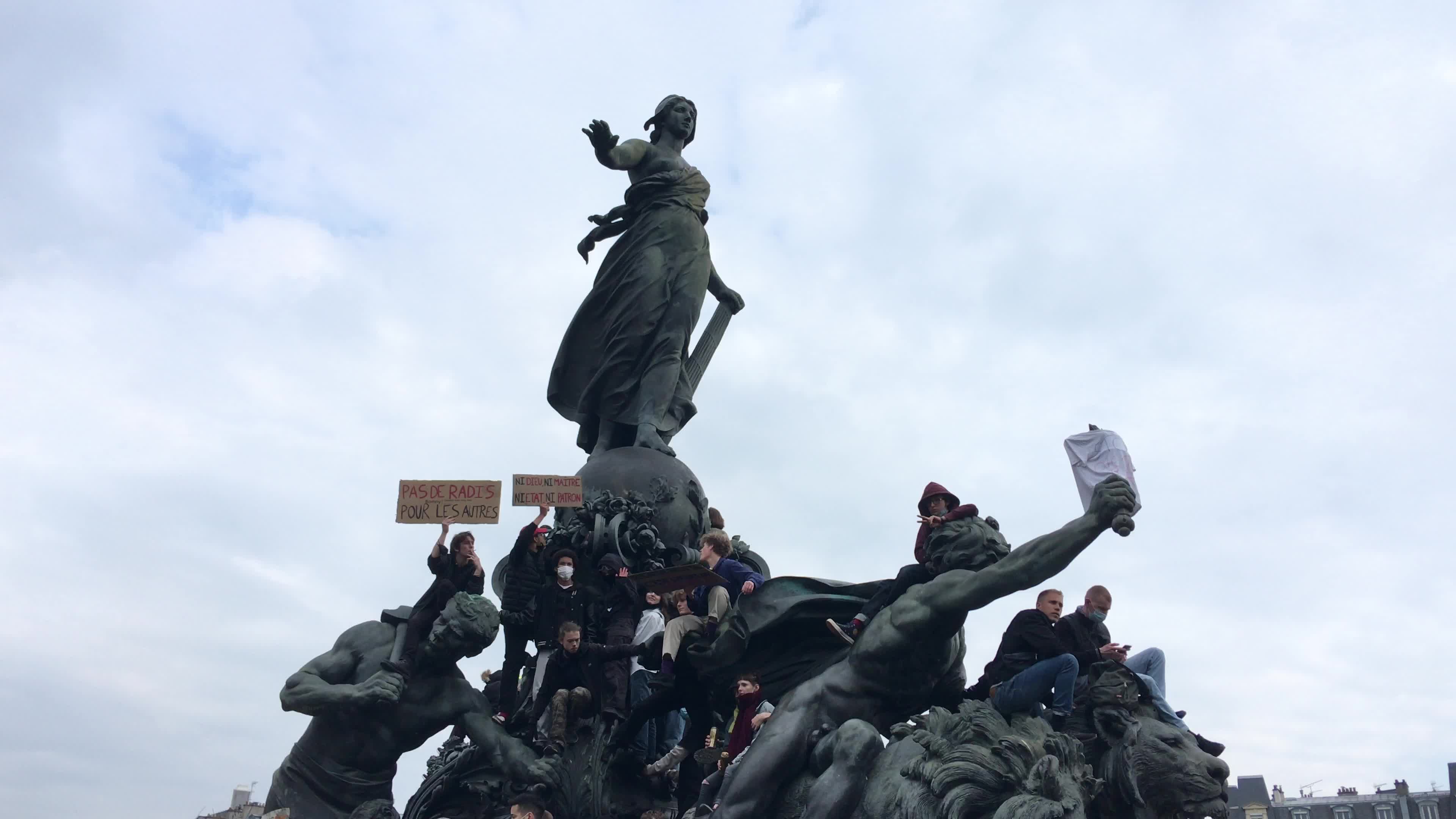 Protesters clash in Paris during the May Day
