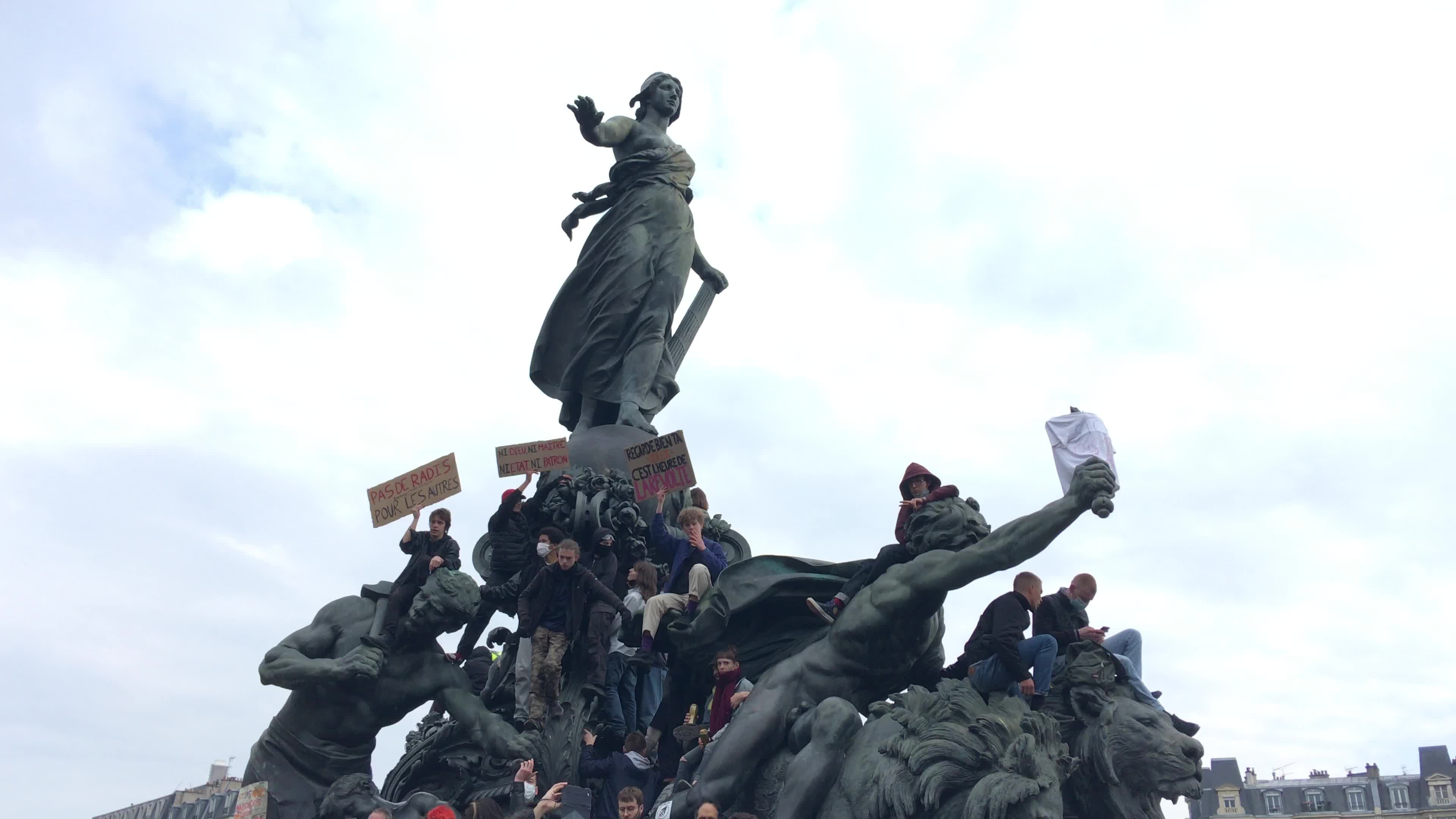 Protesters clash in Paris during the May Day