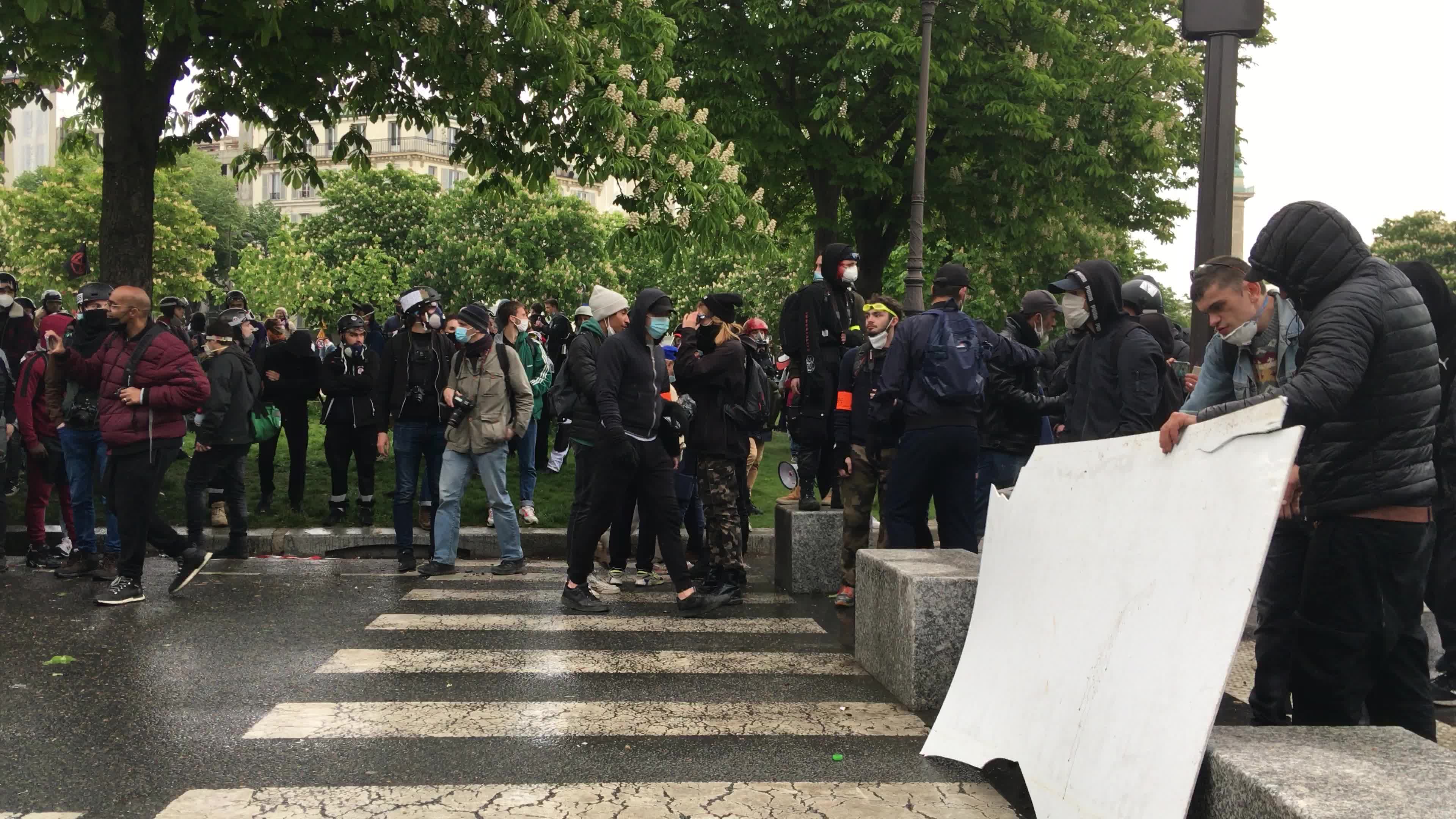 Protesters clash in Paris during the May Day
