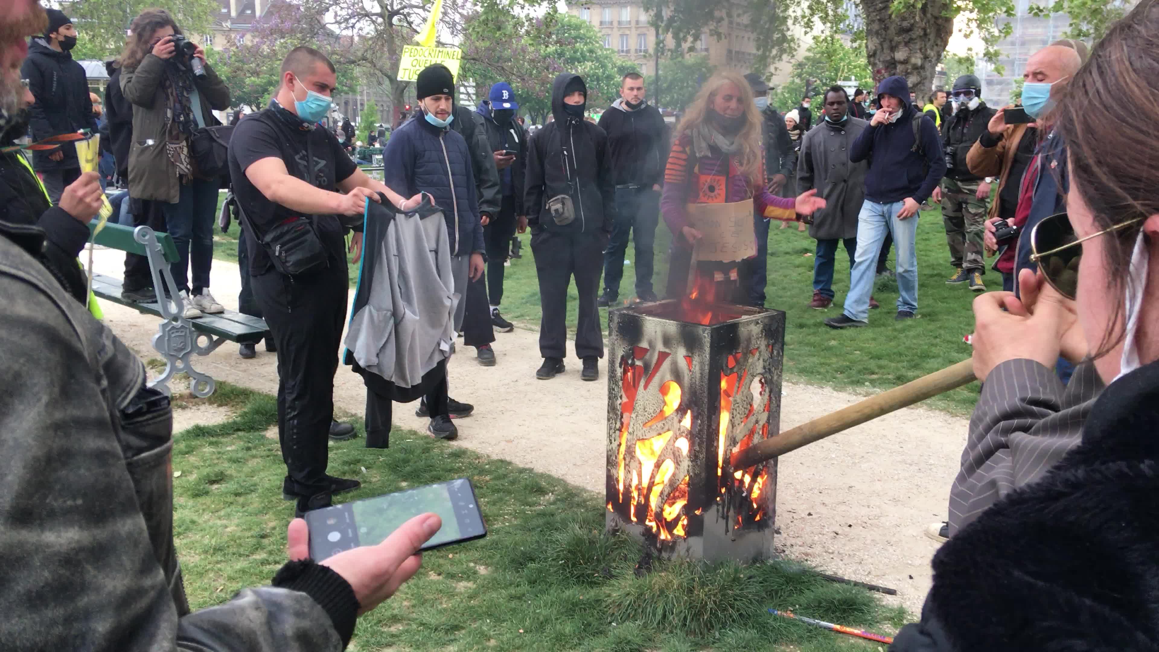 Protesters clash in Paris during the May Day