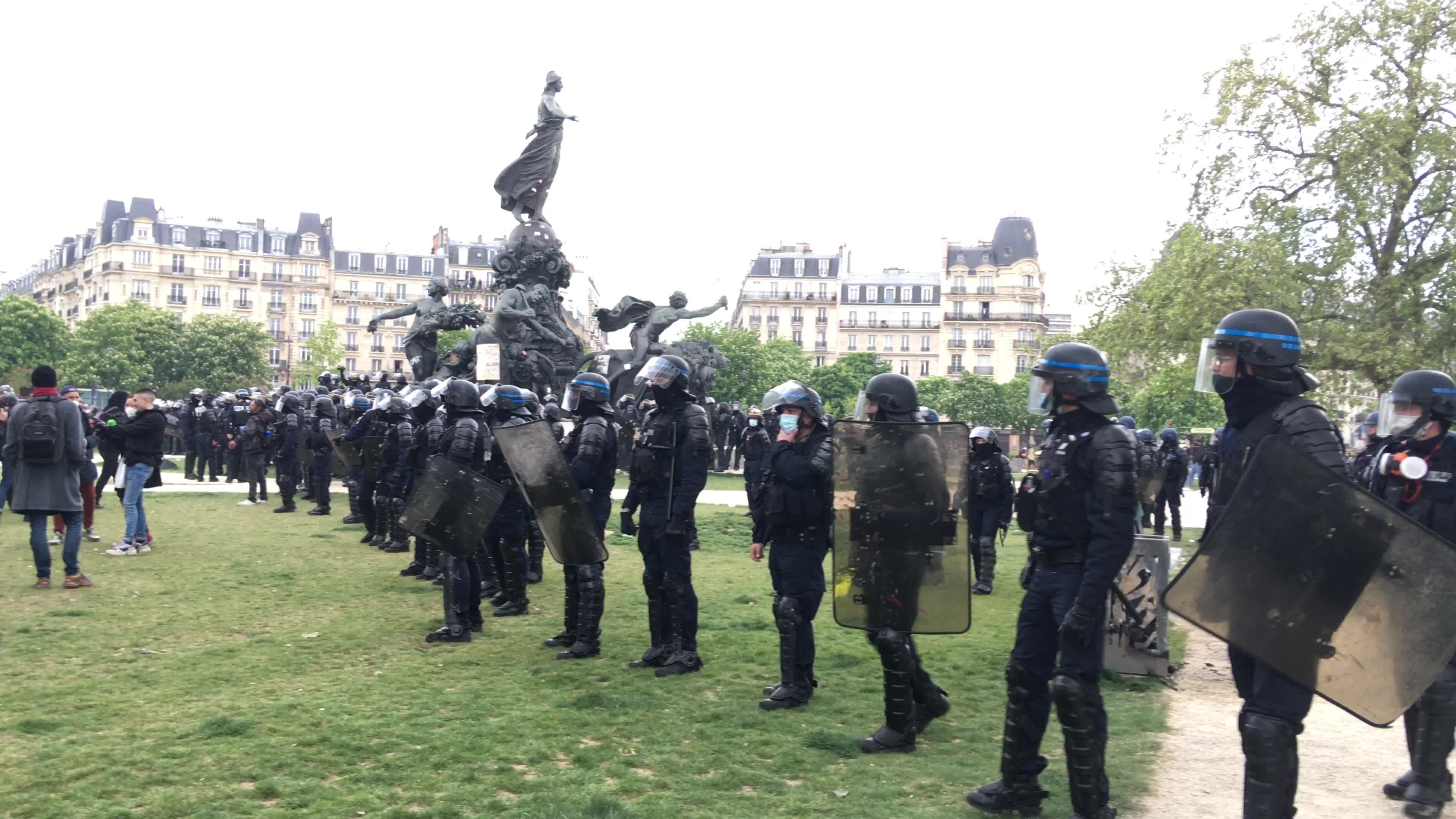 Protesters clash in Paris during the May Day