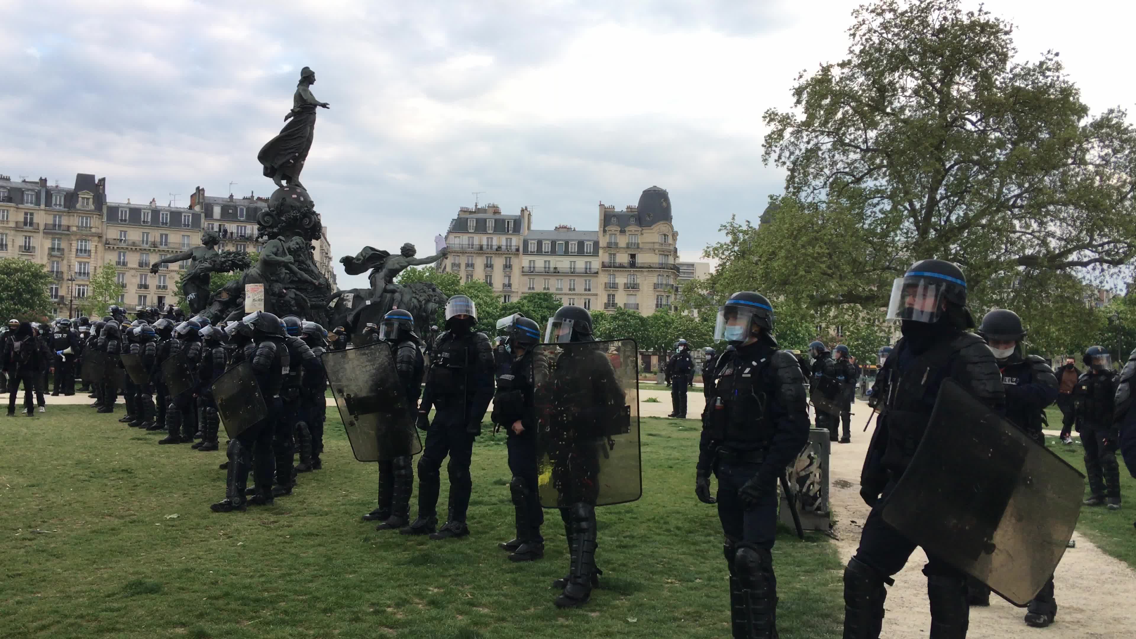 Protesters clash in Paris during the May Day