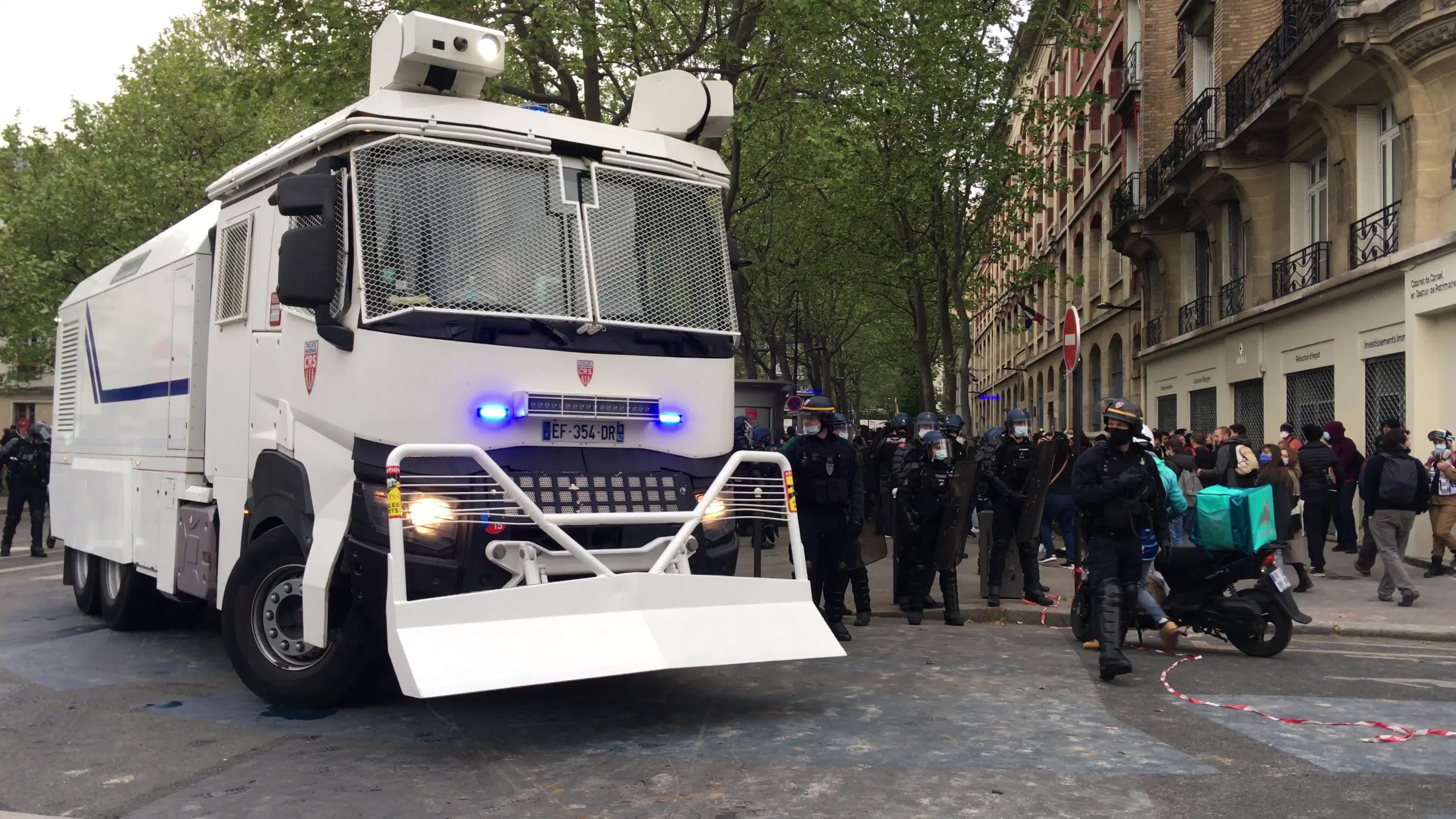 Protesters clash in Paris during the May Day