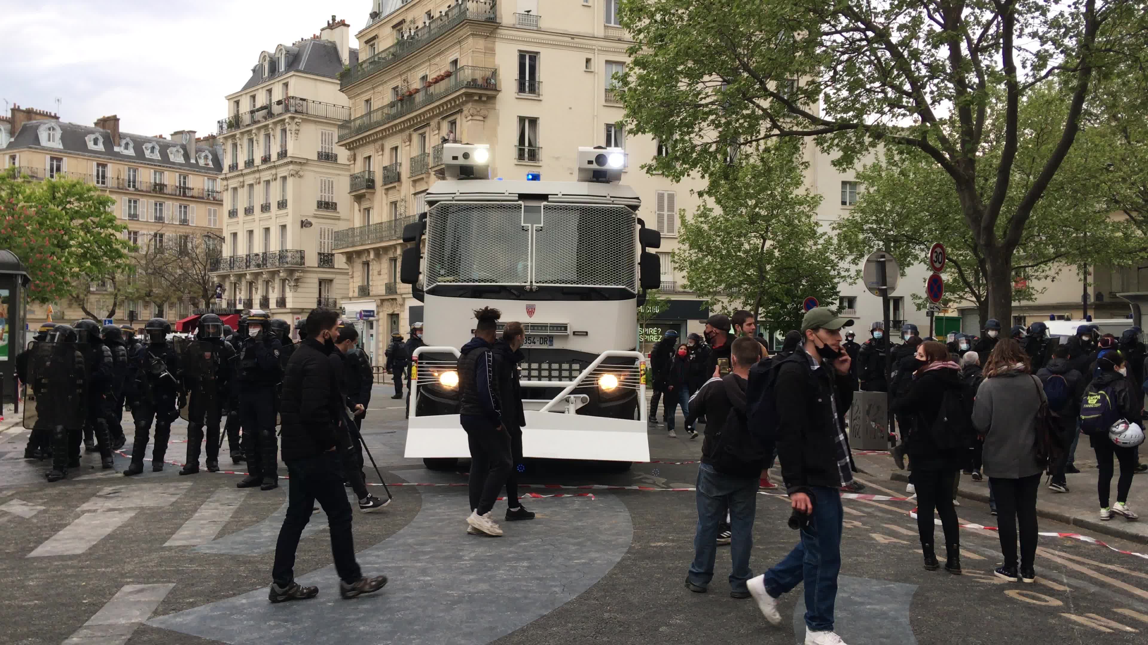 Protesters clash in Paris during the May Day