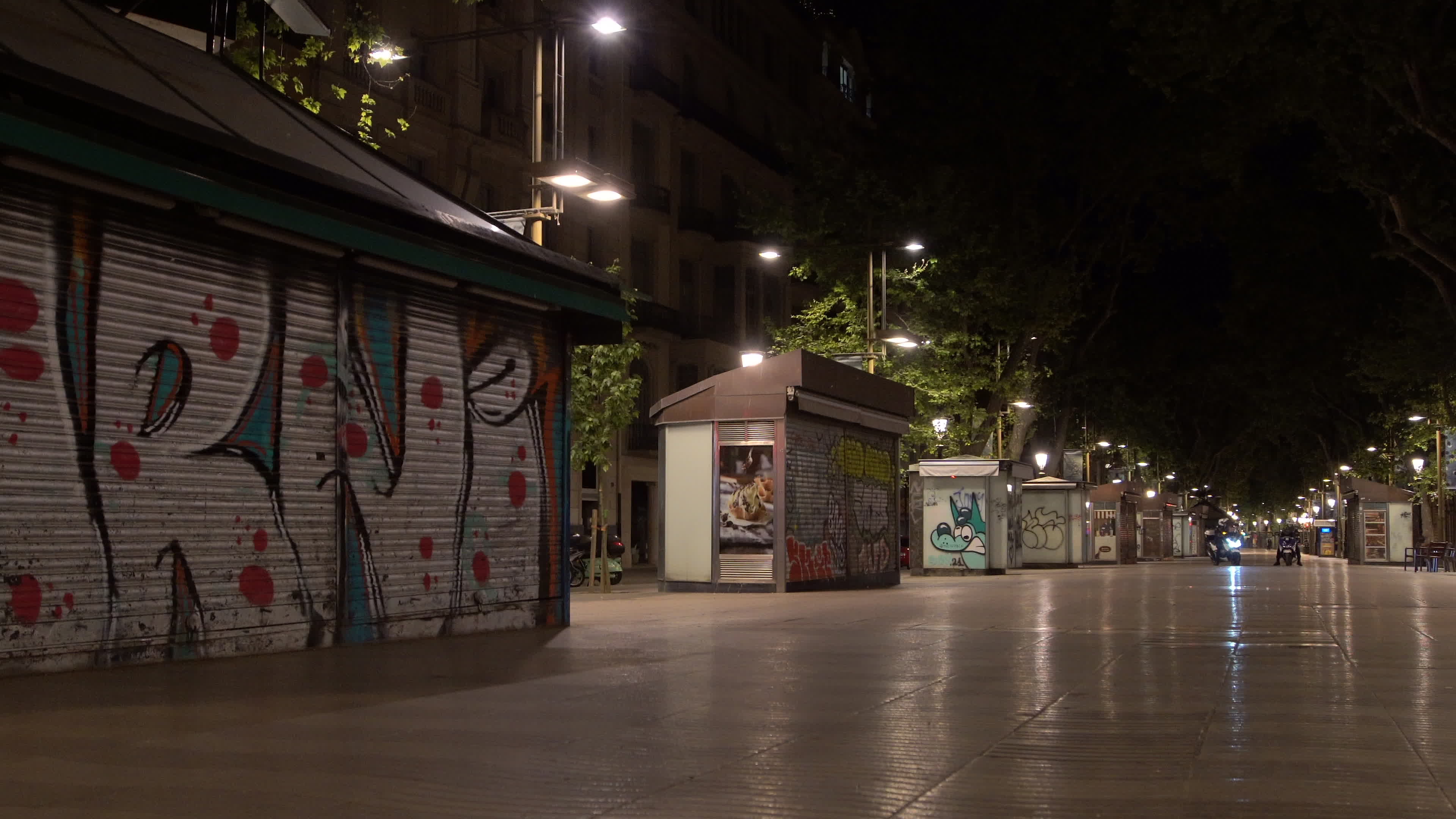 Police officers patrol "Las Ramblas" during curfew