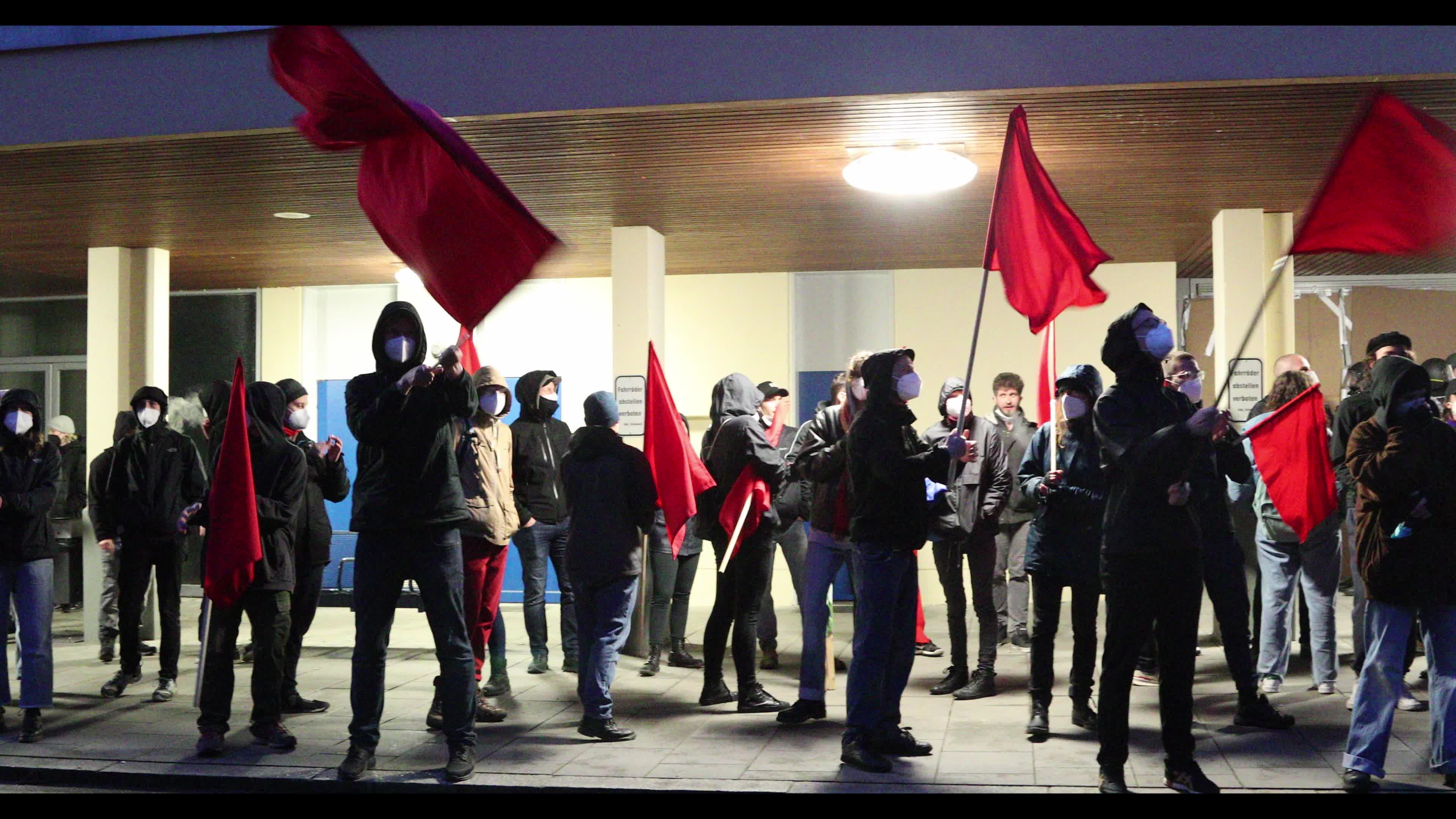 Anticapitalist demonstration in the suburb Gruenwald near Munich