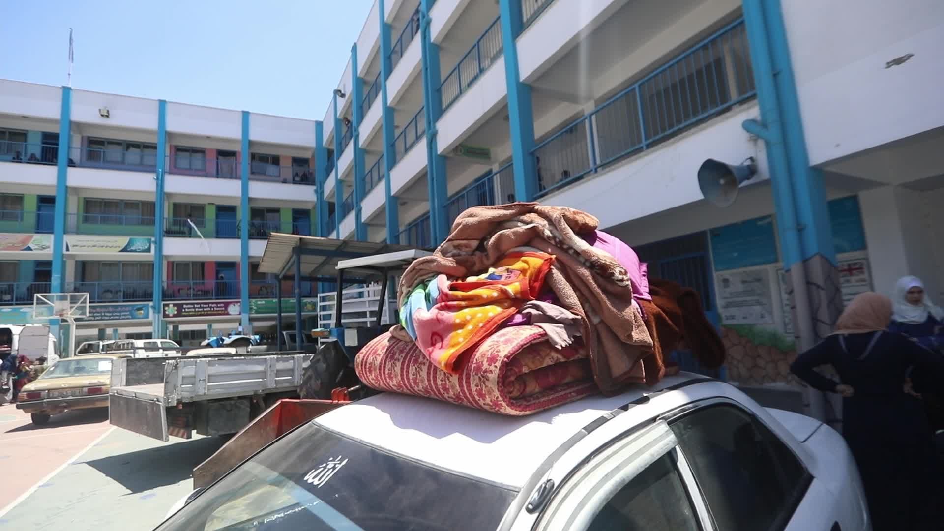 Palestinian families flee to UNRWA schools due to the continuous shelling of Gaza city