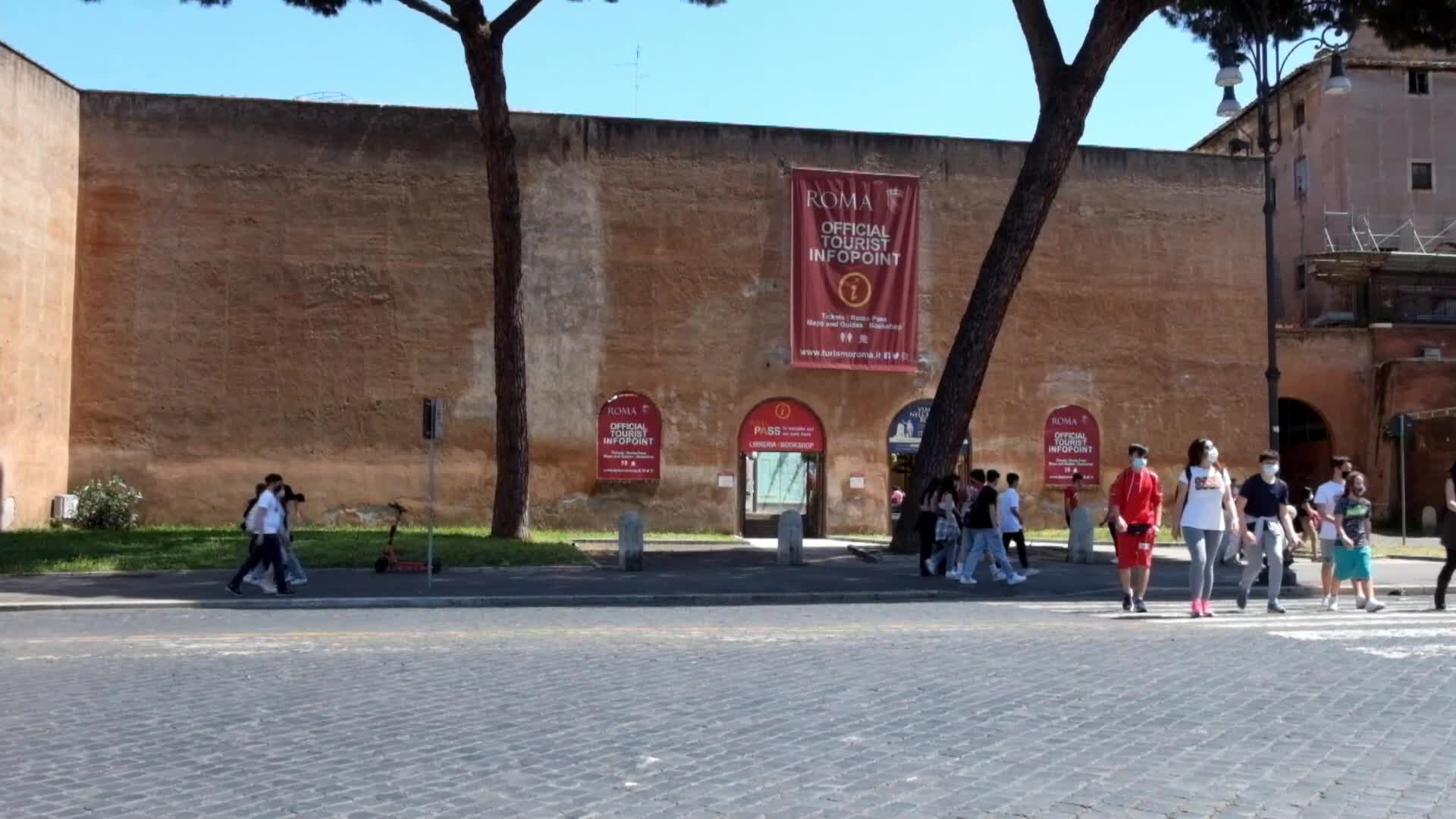 Tourists near the Colosseum in Rome, Italy