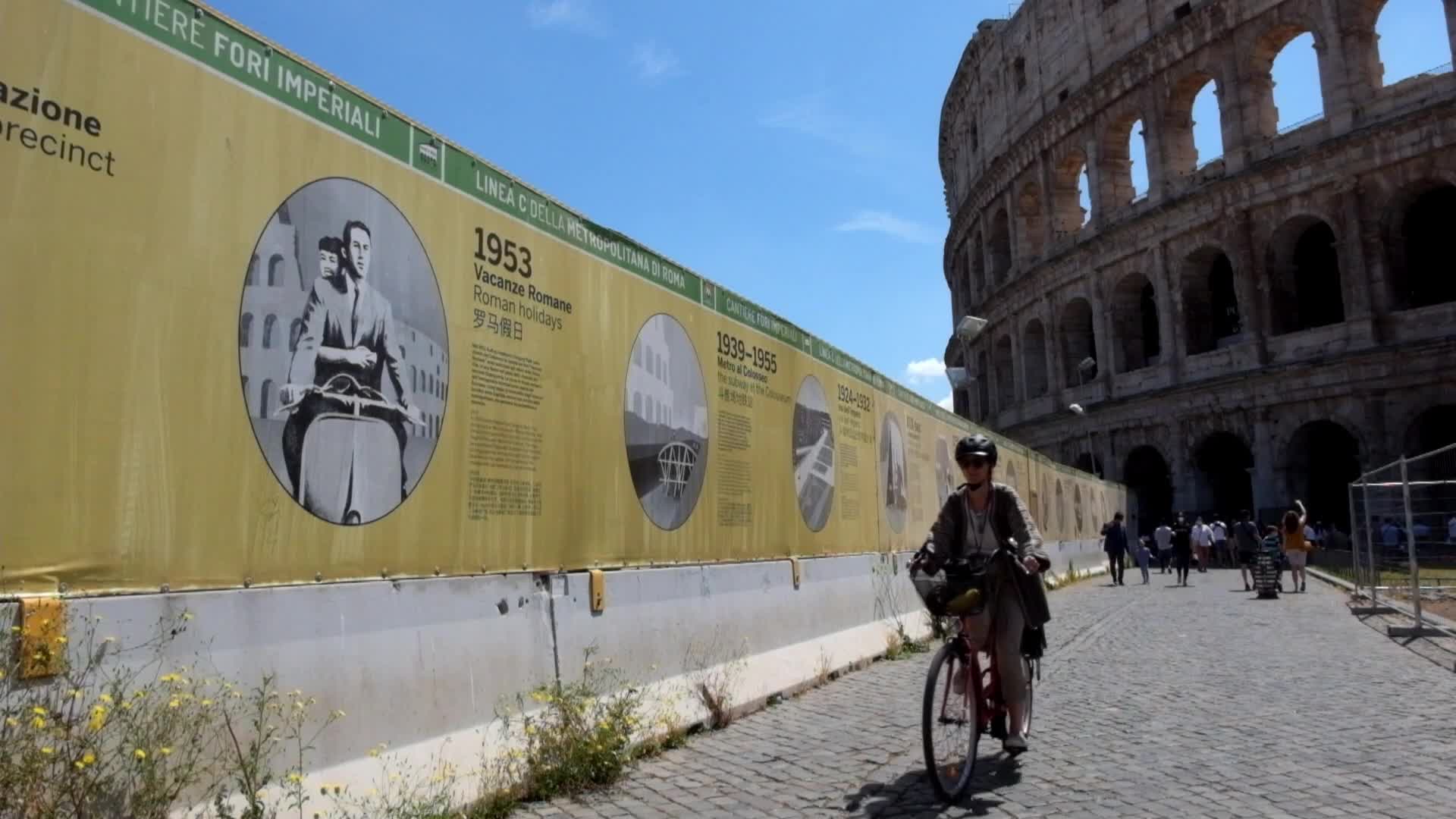 Tourists near the Colosseum in Rome, Italy