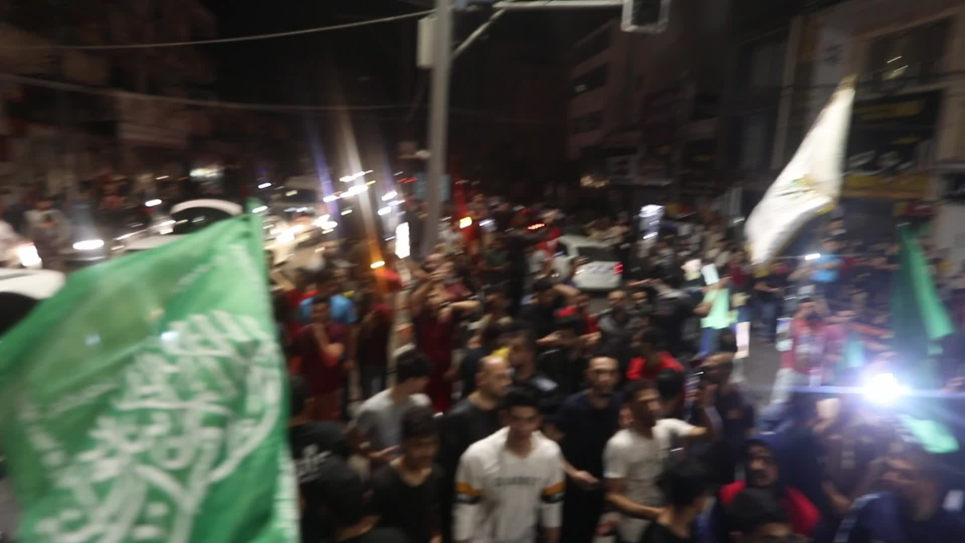 Palestinian celebrate the ceasefire with Israel