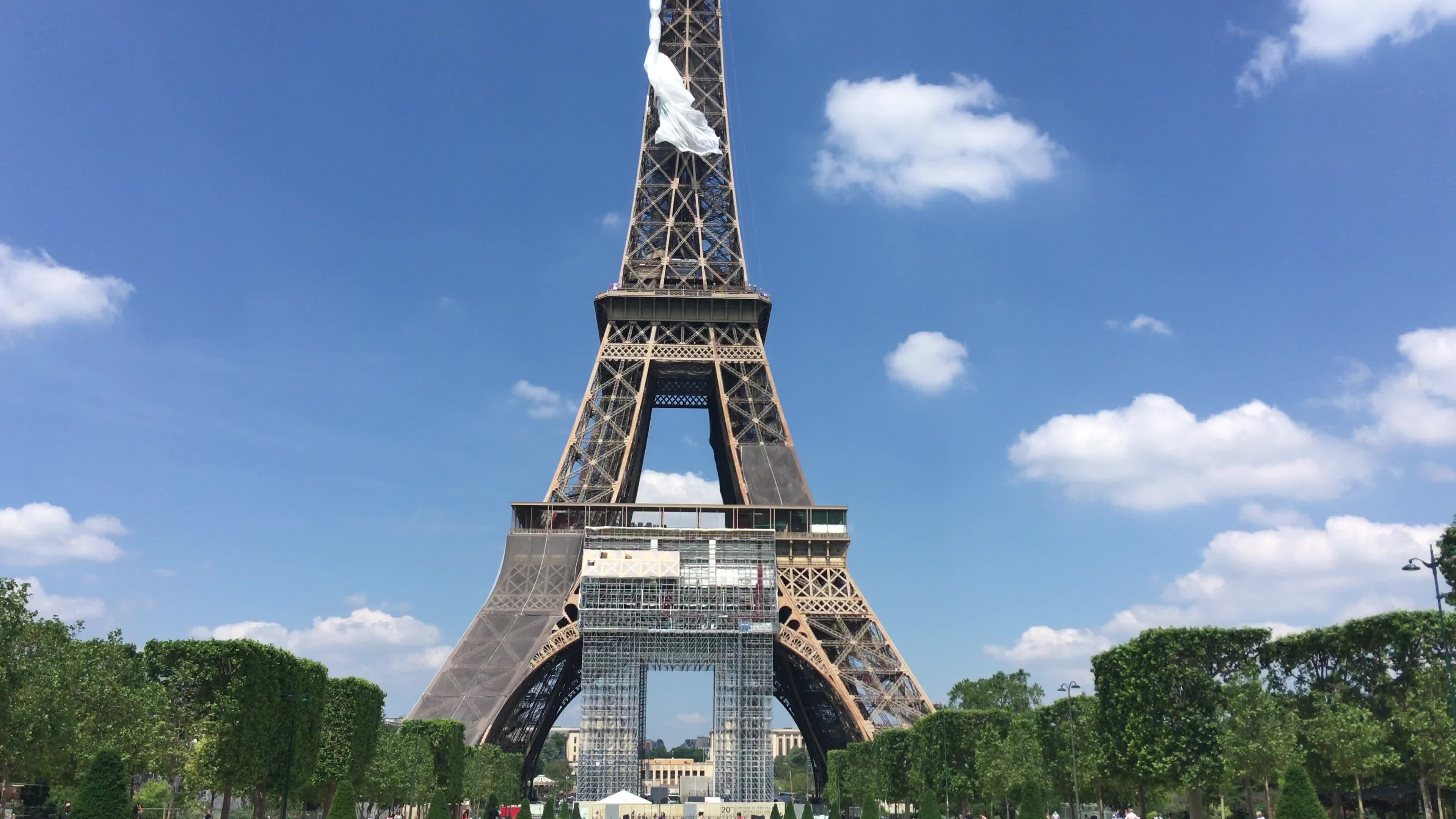  A giant flag at the top of the Eiffel Tower 
