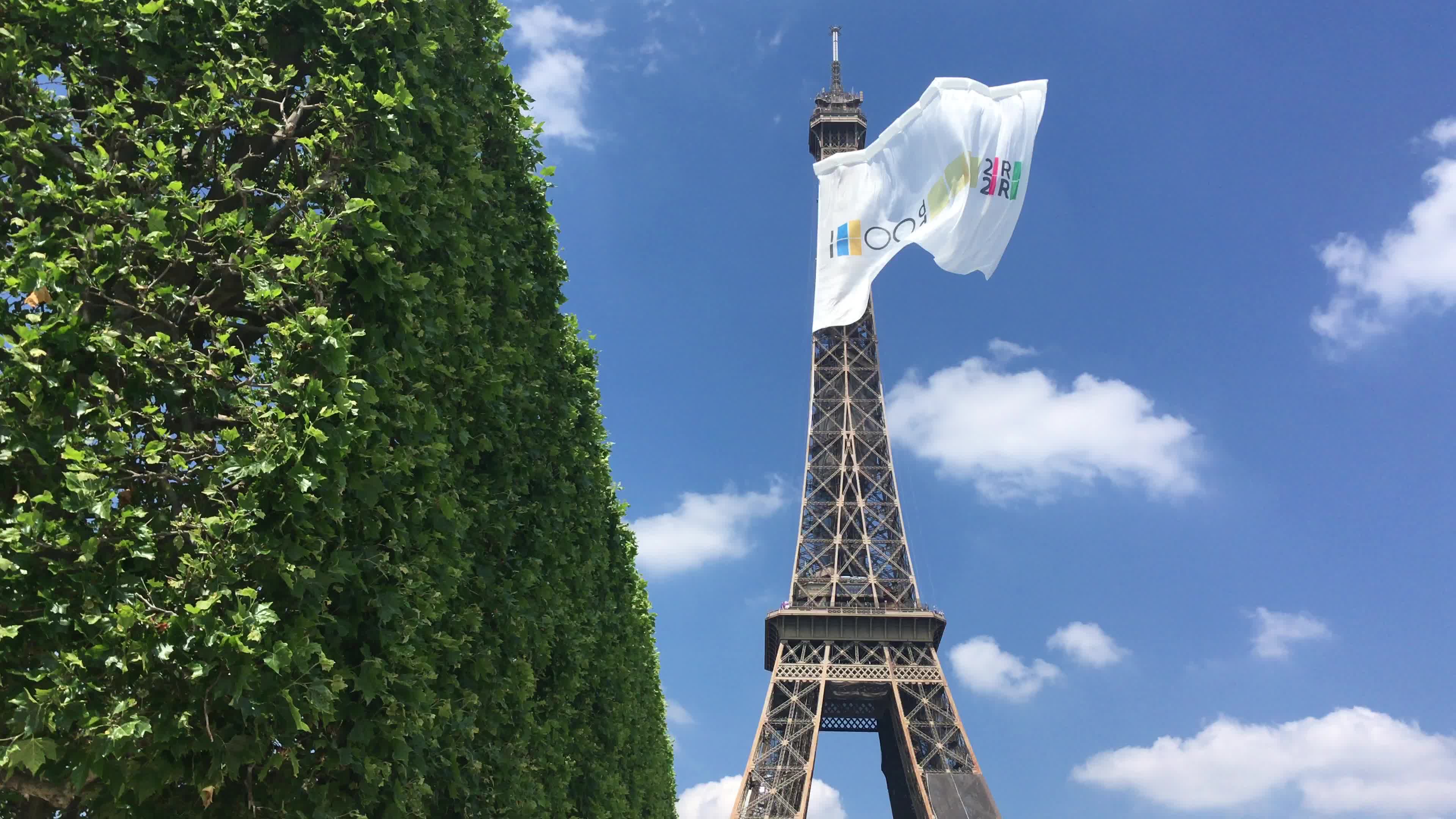  A giant flag at the top of the Eiffel Tower 