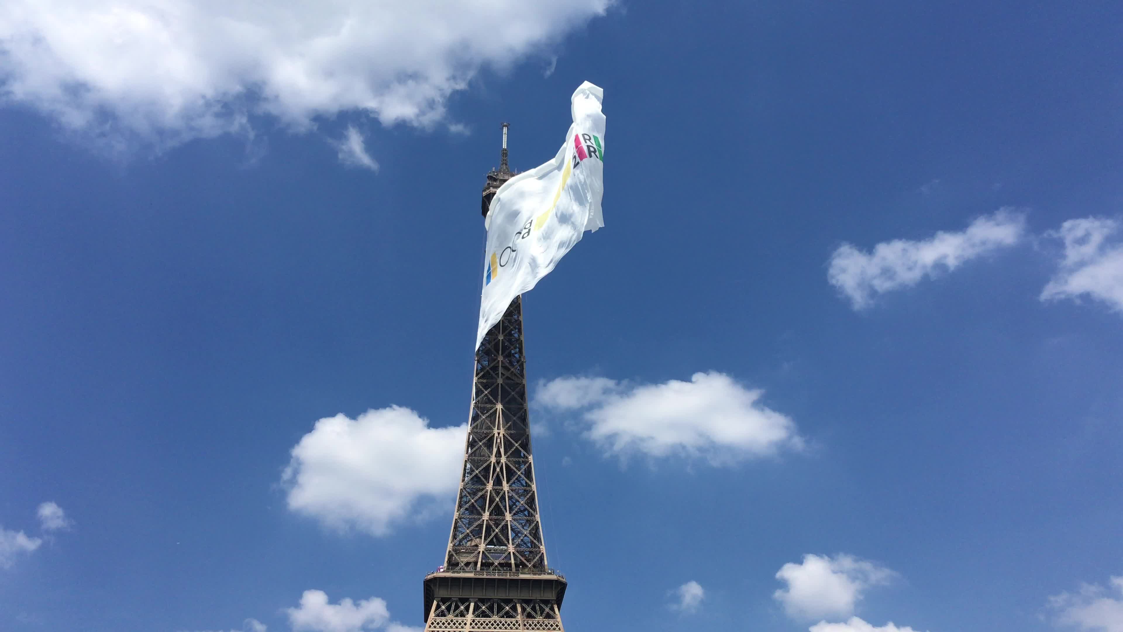  A giant flag at the top of the Eiffel Tower 
