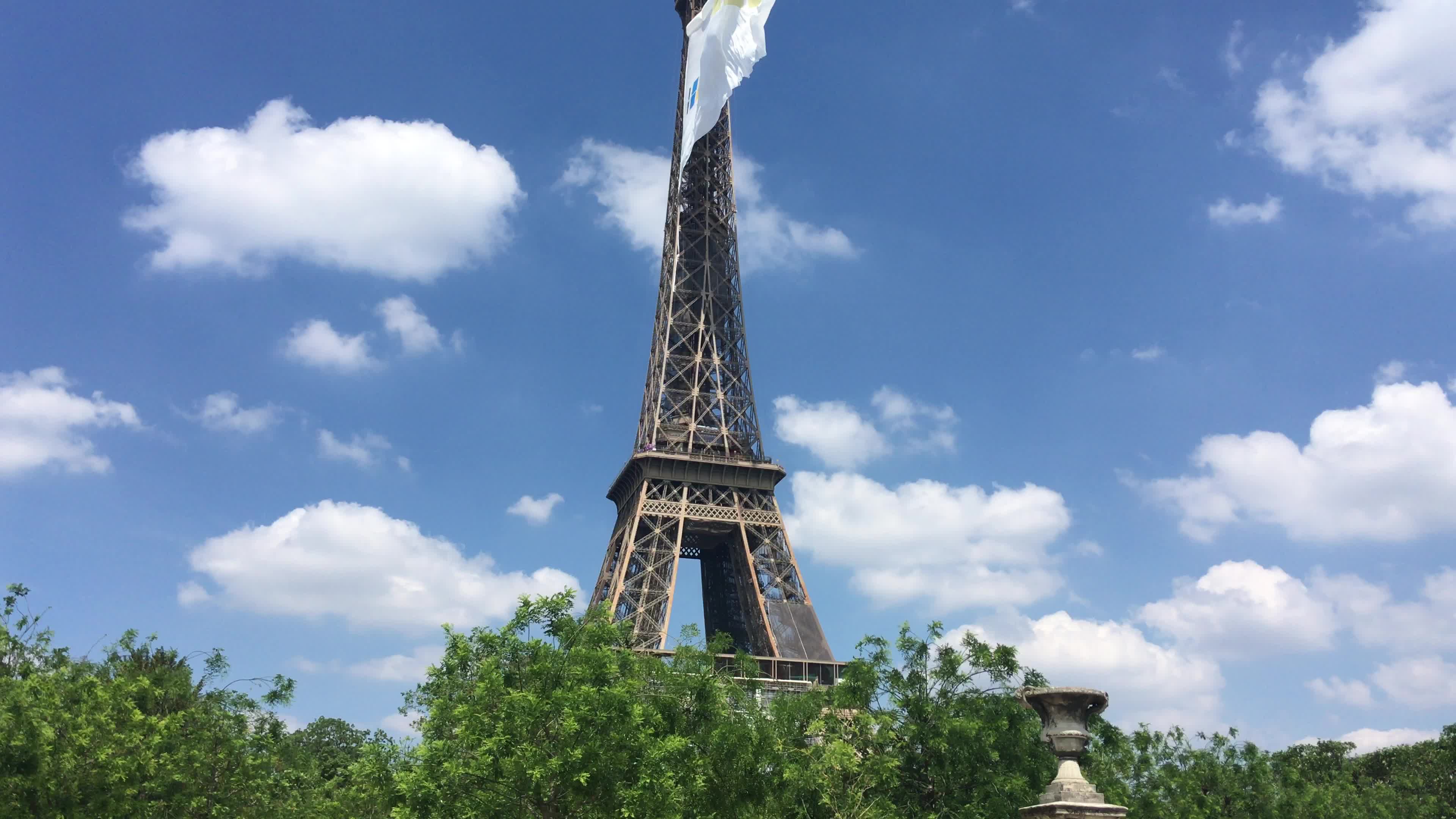  A giant flag at the top of the Eiffel Tower 