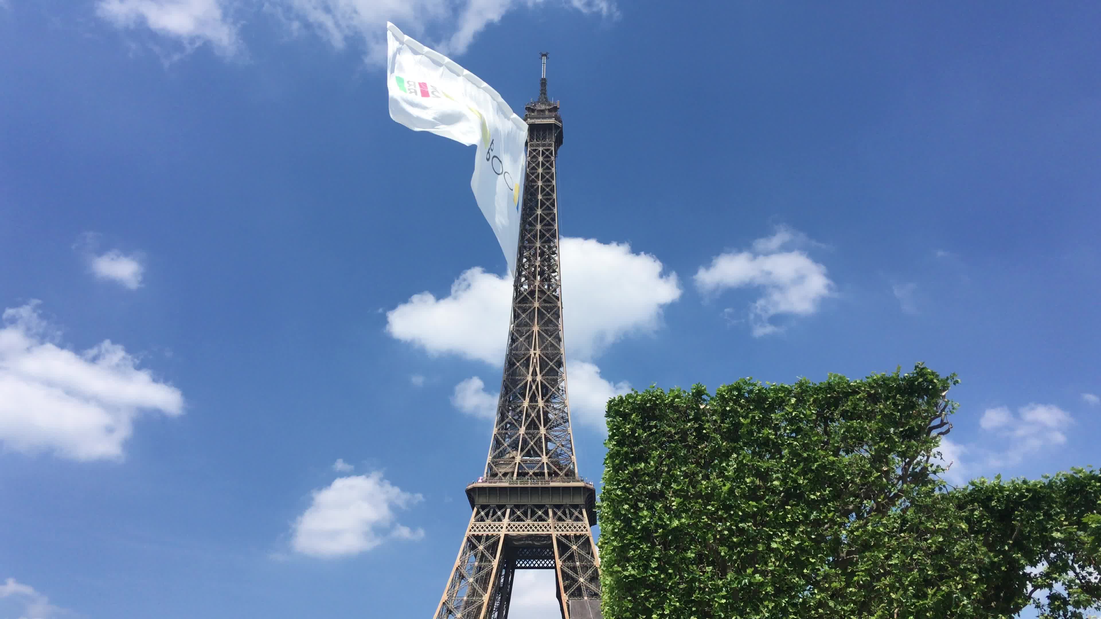  A giant flag at the top of the Eiffel Tower 