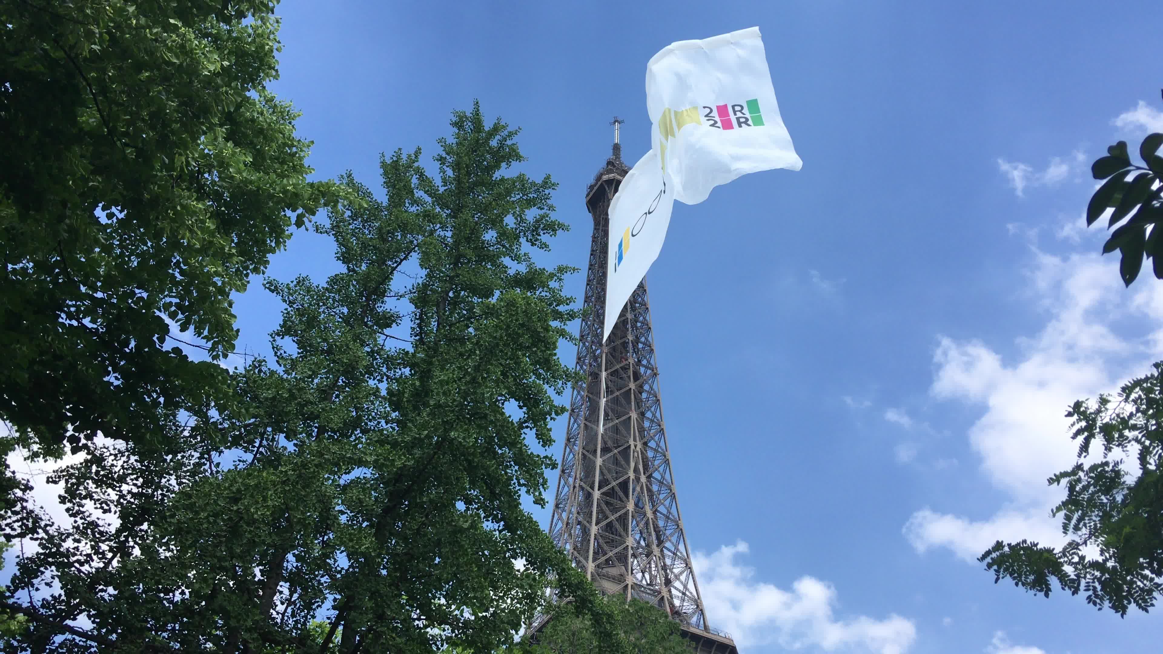  A giant flag at the top of the Eiffel Tower 