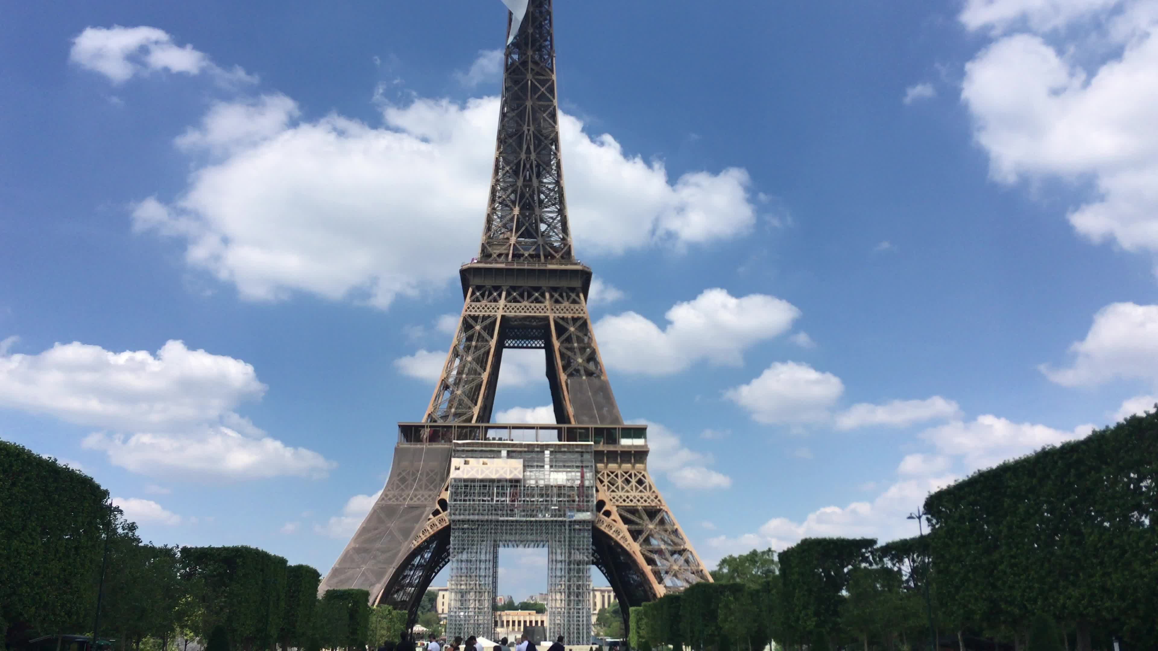  A giant flag at the top of the Eiffel Tower 