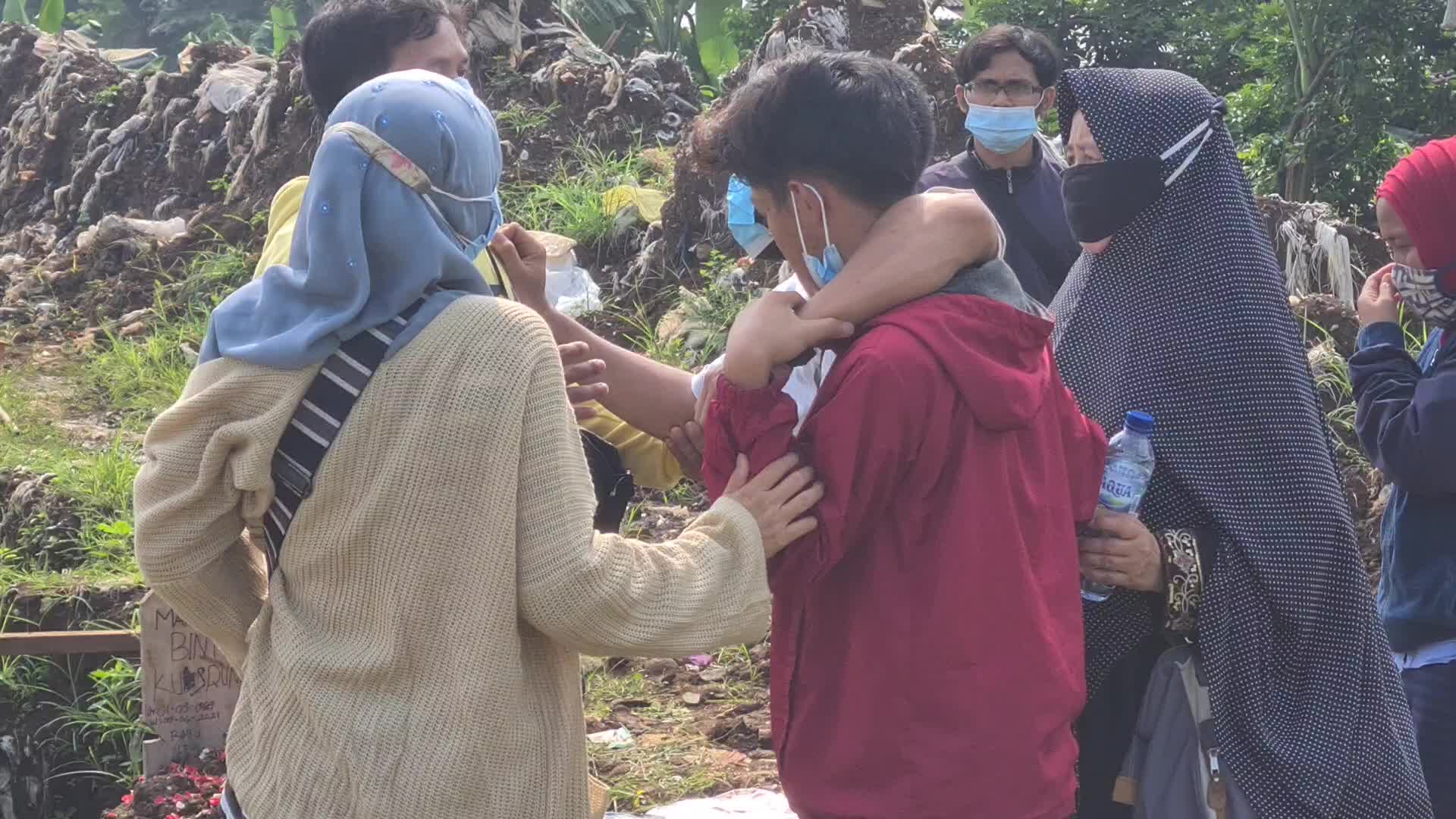 Burial of Covid-19 victims in indonesia