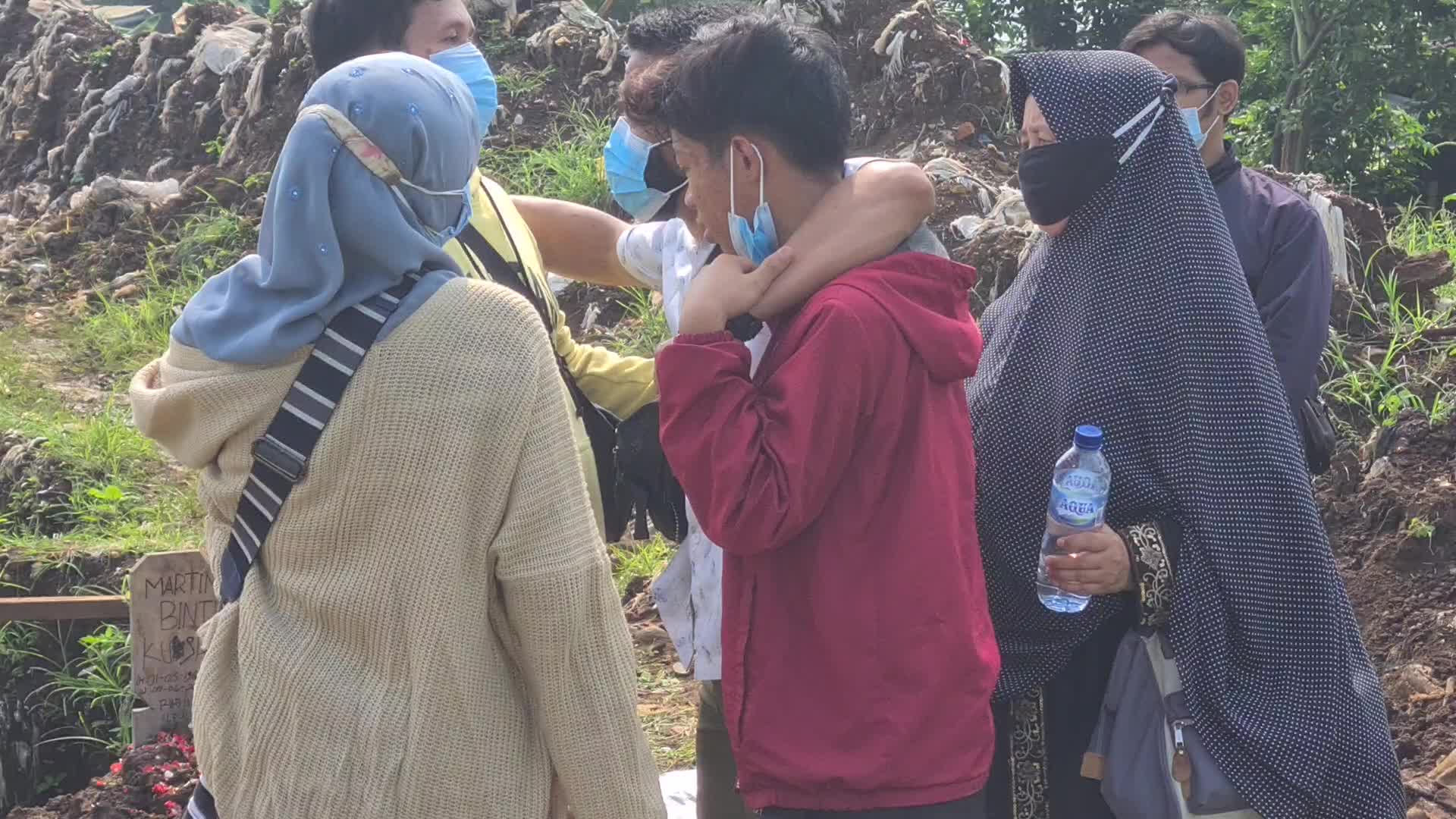 Burial of Covid-19 victims in indonesia