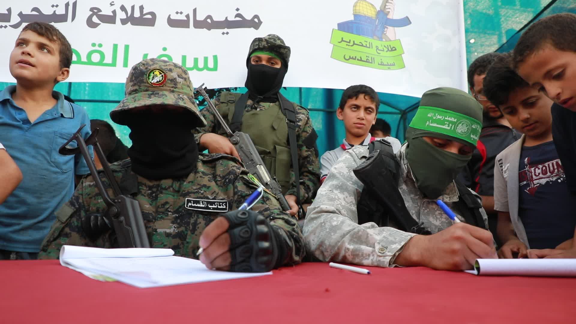 Palestinians registers to a summer camp organized by brigades in Gaza