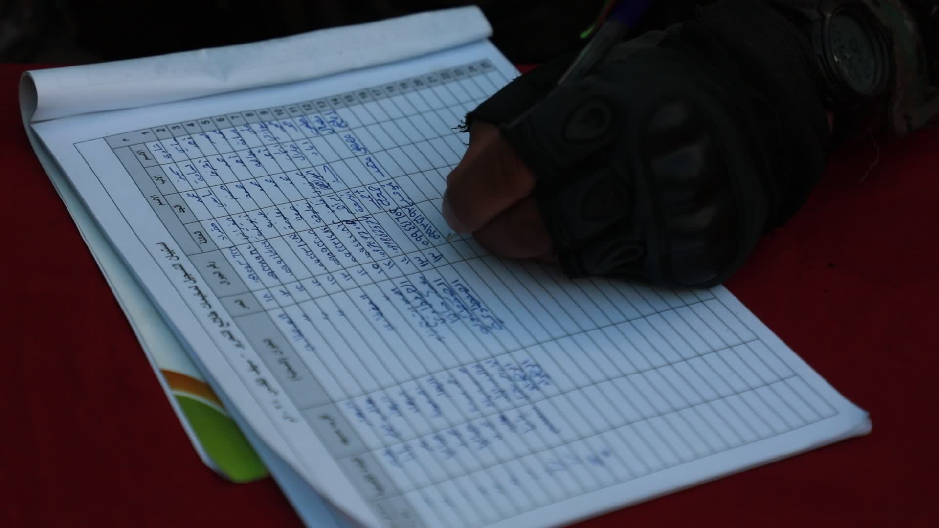 Palestinians registers to a summer camp organized by brigades in Gaza