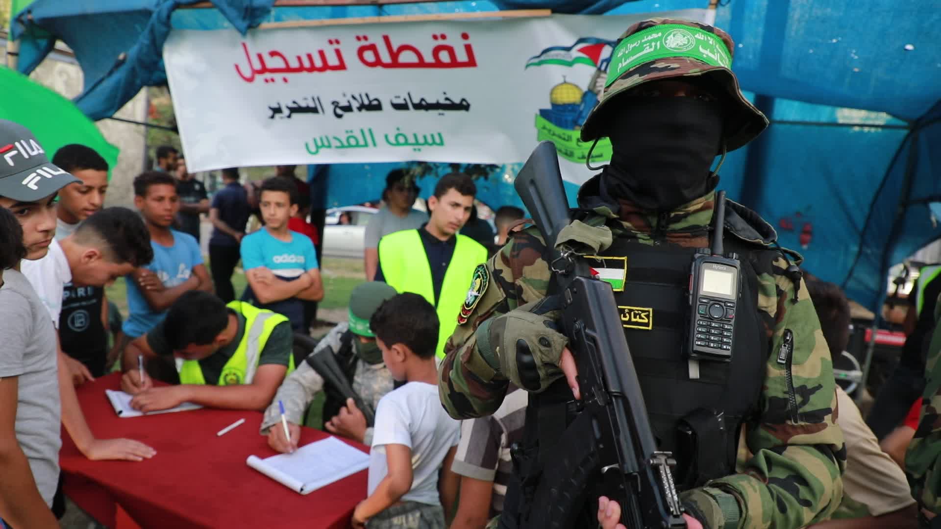 Palestinians registers to a summer camp organized by brigades in Gaza