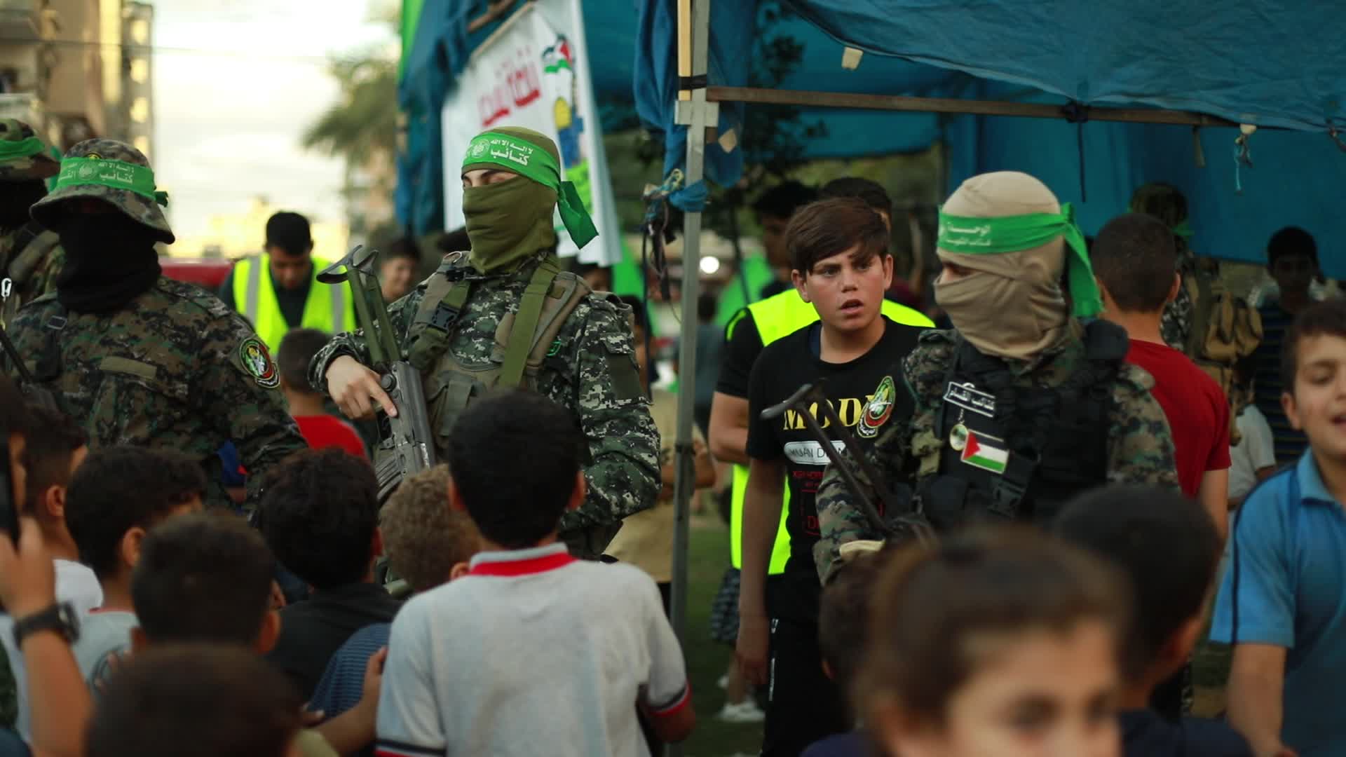 Palestinians registers to a summer camp organized by brigades in Gaza