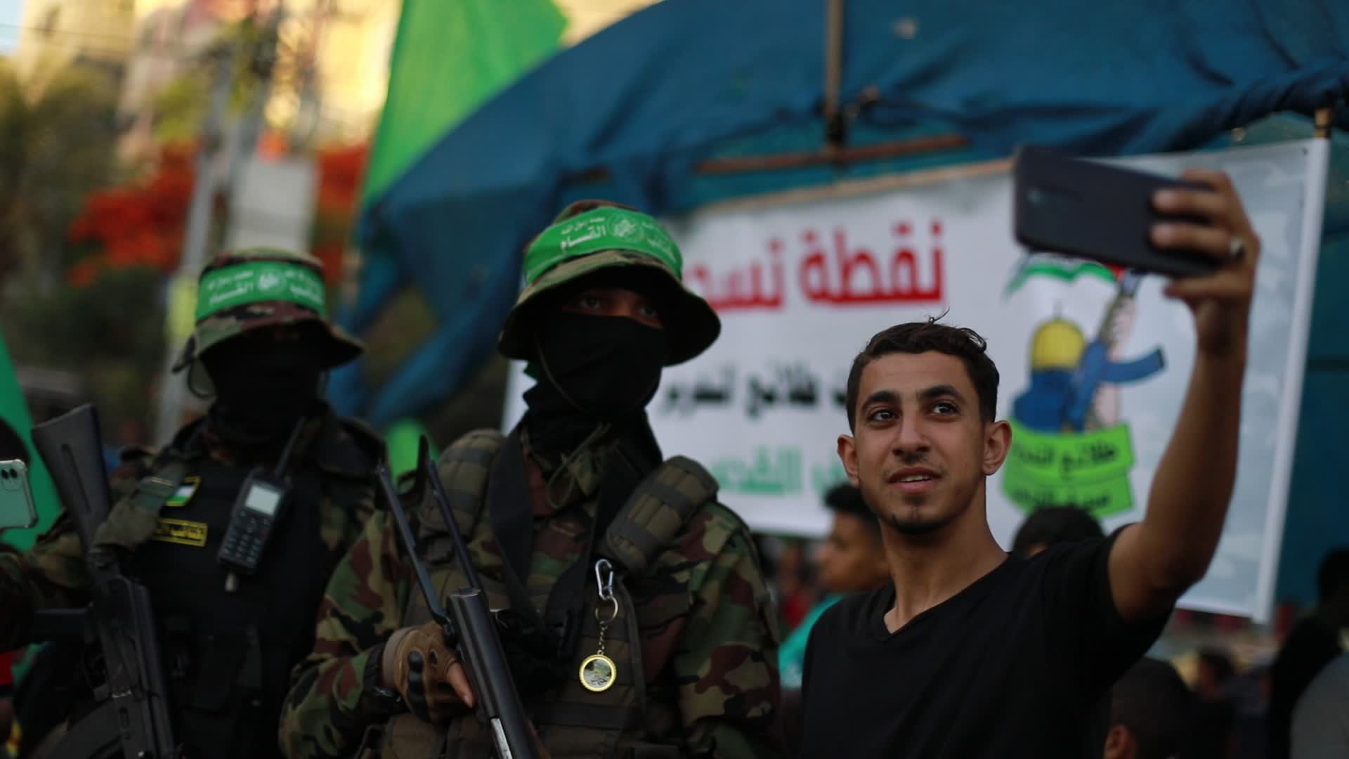 Palestinians registers to a summer camp organized by brigades in Gaza