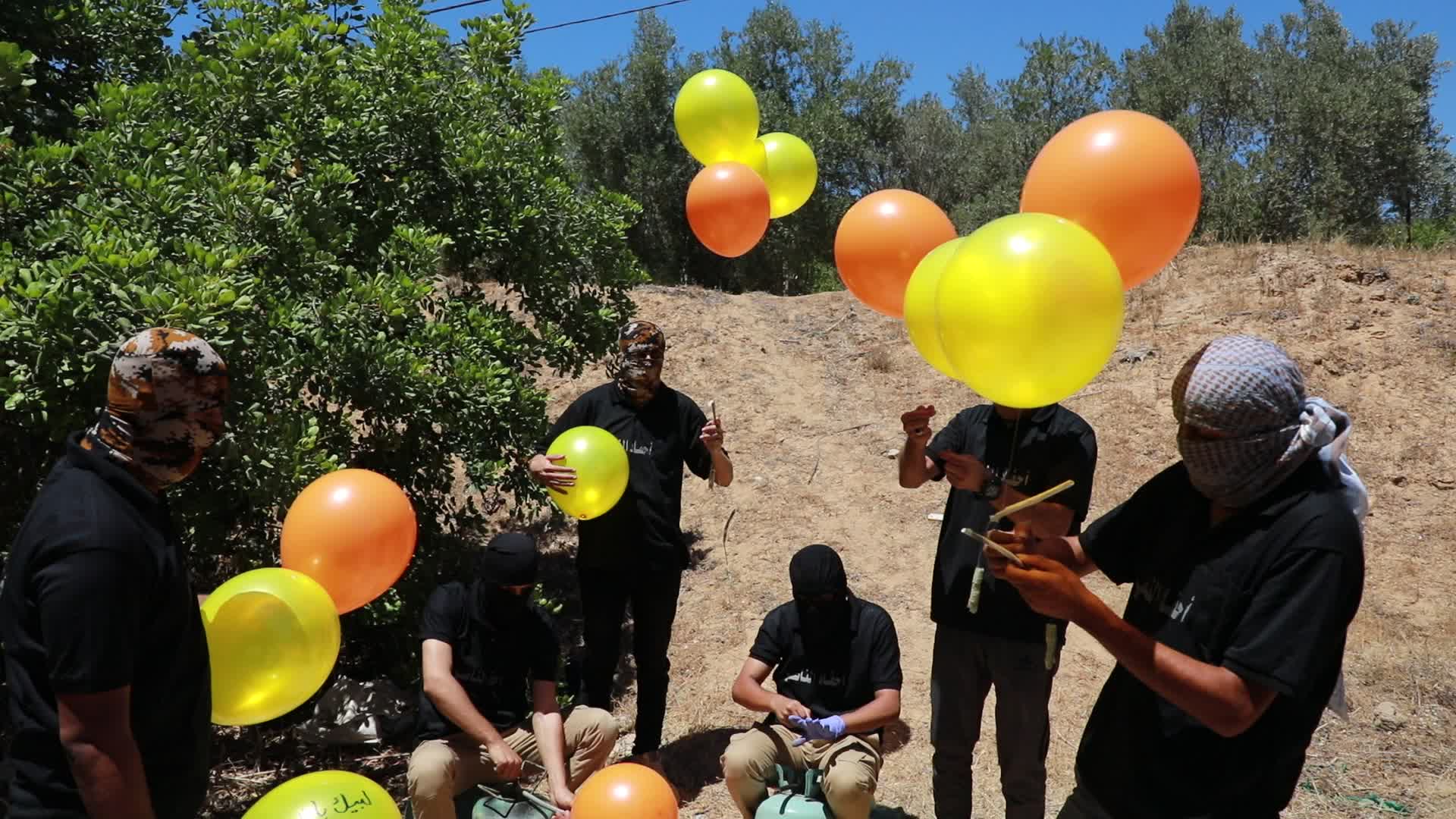 Preparation of incendiary balloons in Gaza