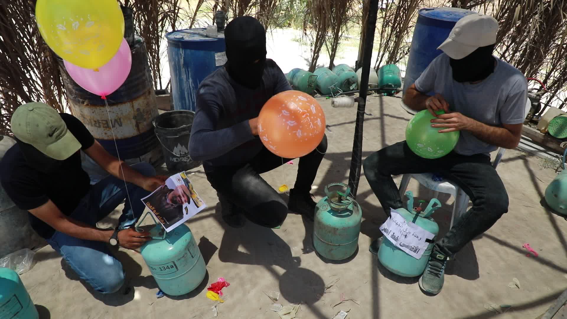 Preparation of incendiary balloons in Gaza