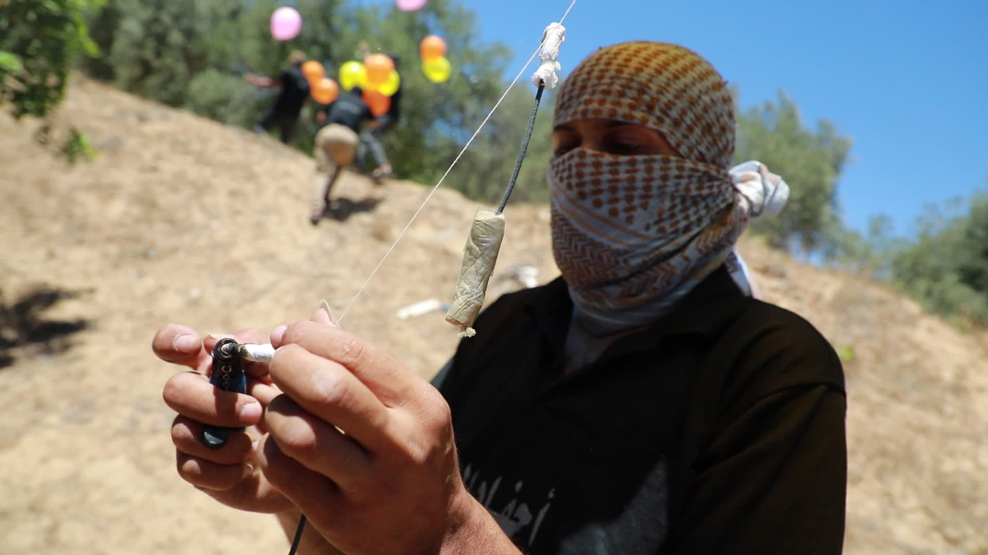 Preparation of incendiary balloons in Gaza
