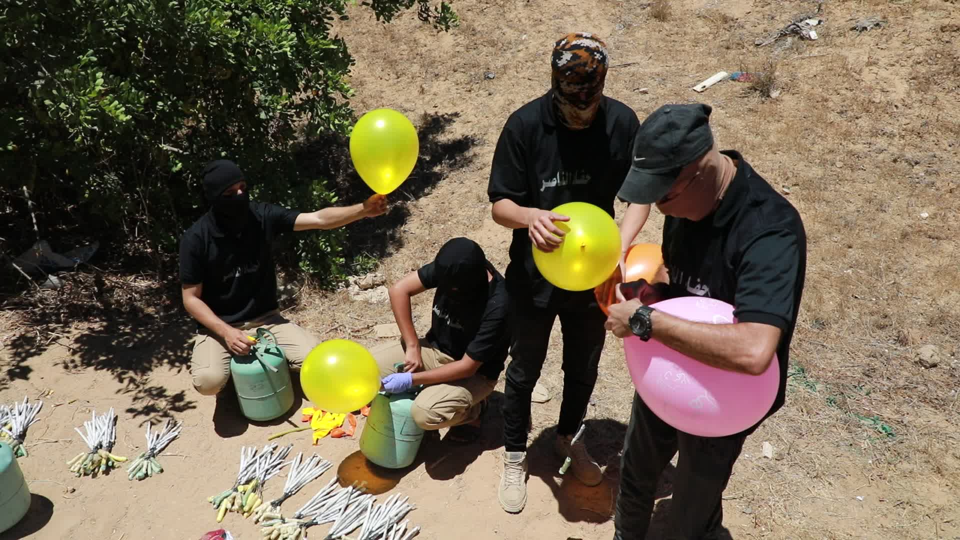 Preparation of incendiary balloons in Gaza