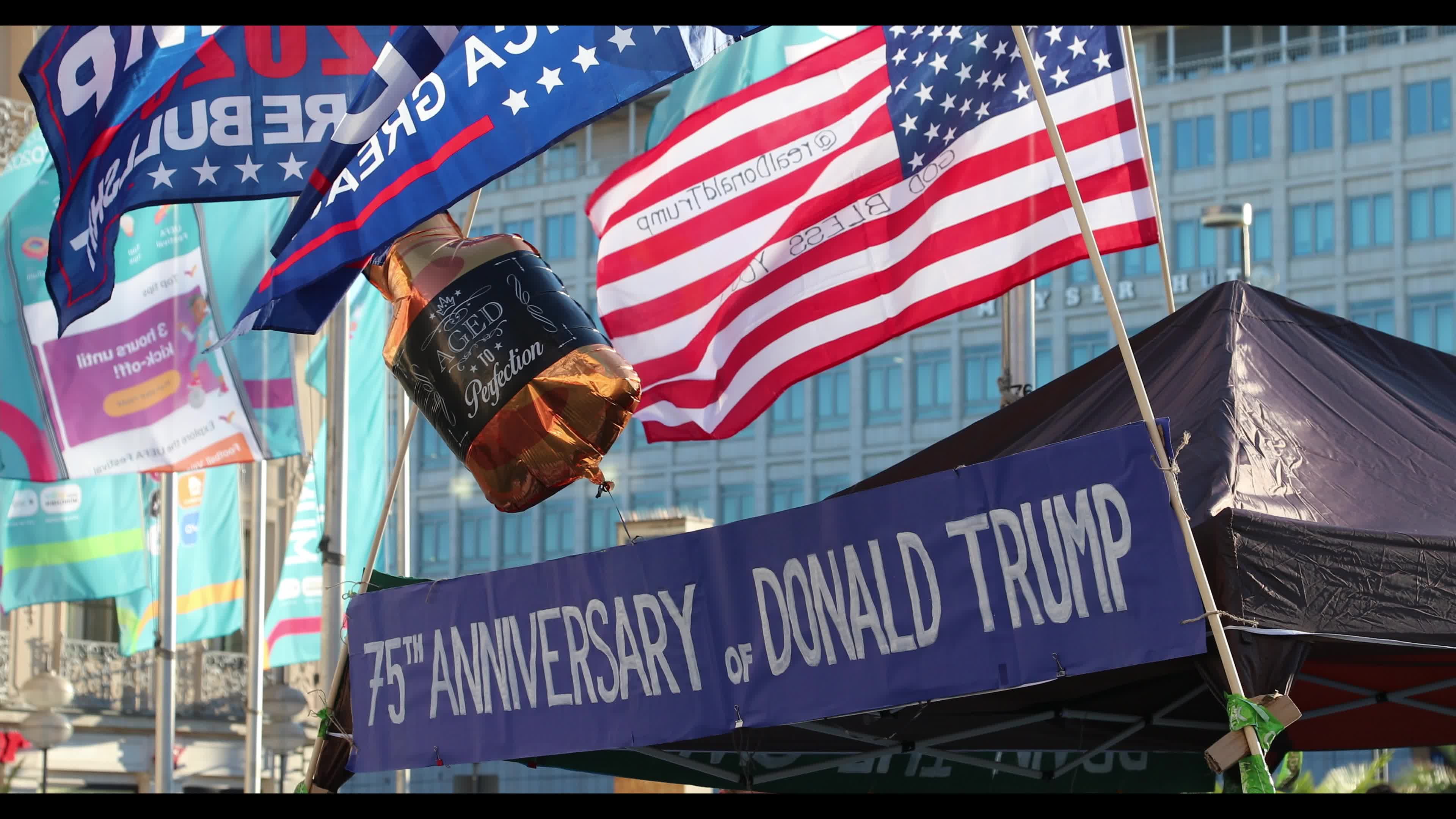 Supporters of Donald Trump celebrate his 75th birthday in Munich, Germany