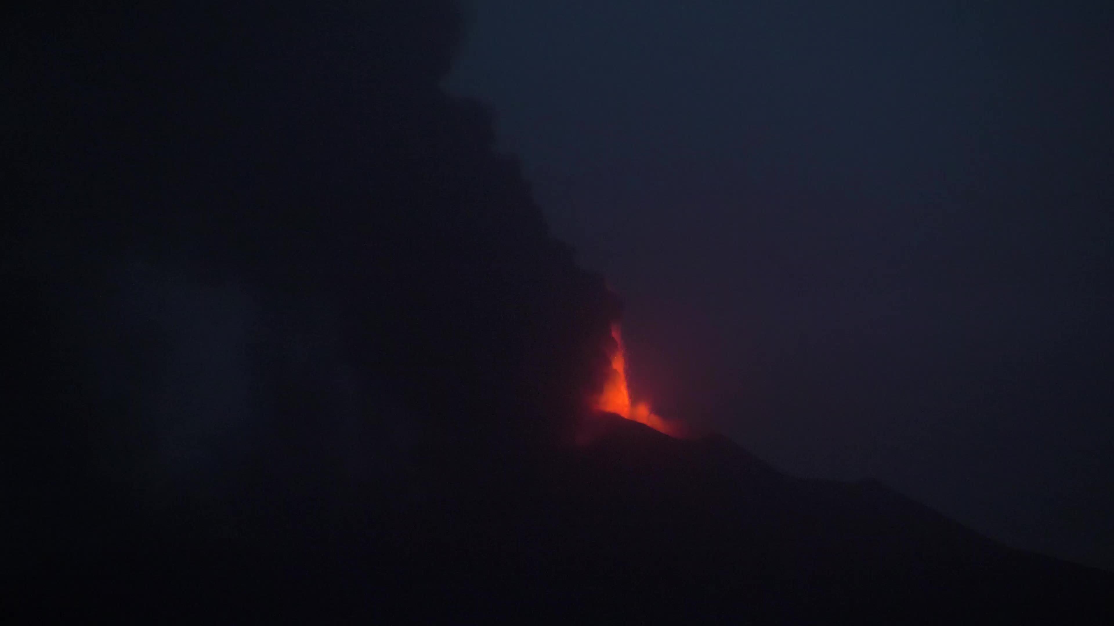 Italy's Mount Etna shoots lava in a night eruption