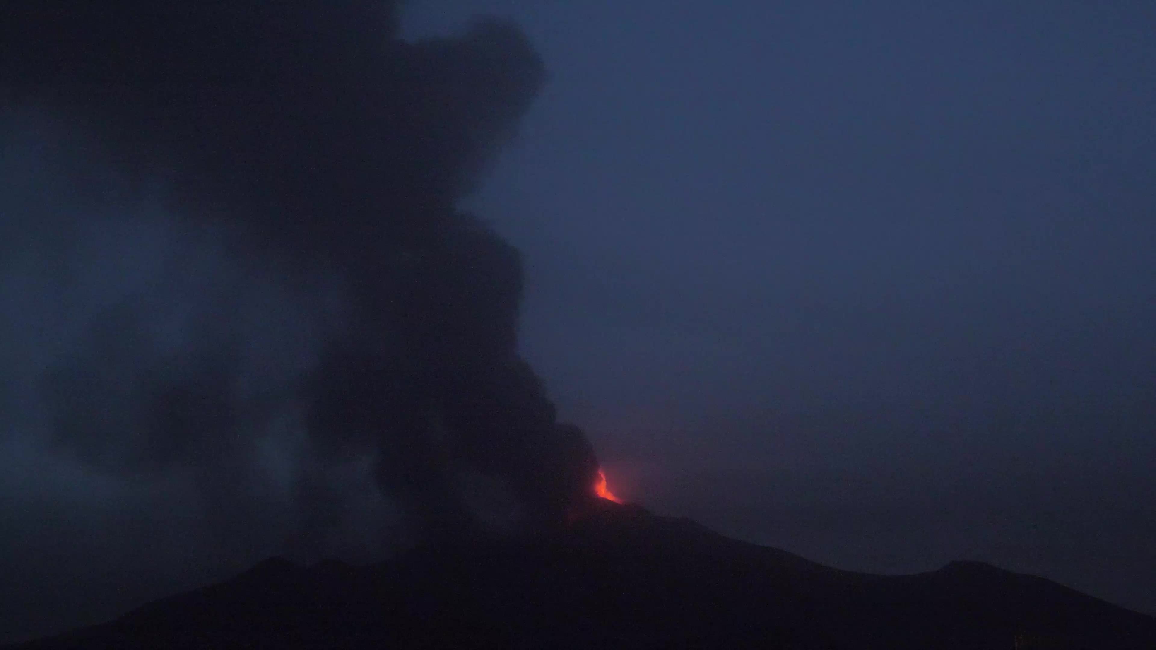 Italy's Mount Etna shoots lava in a night eruption