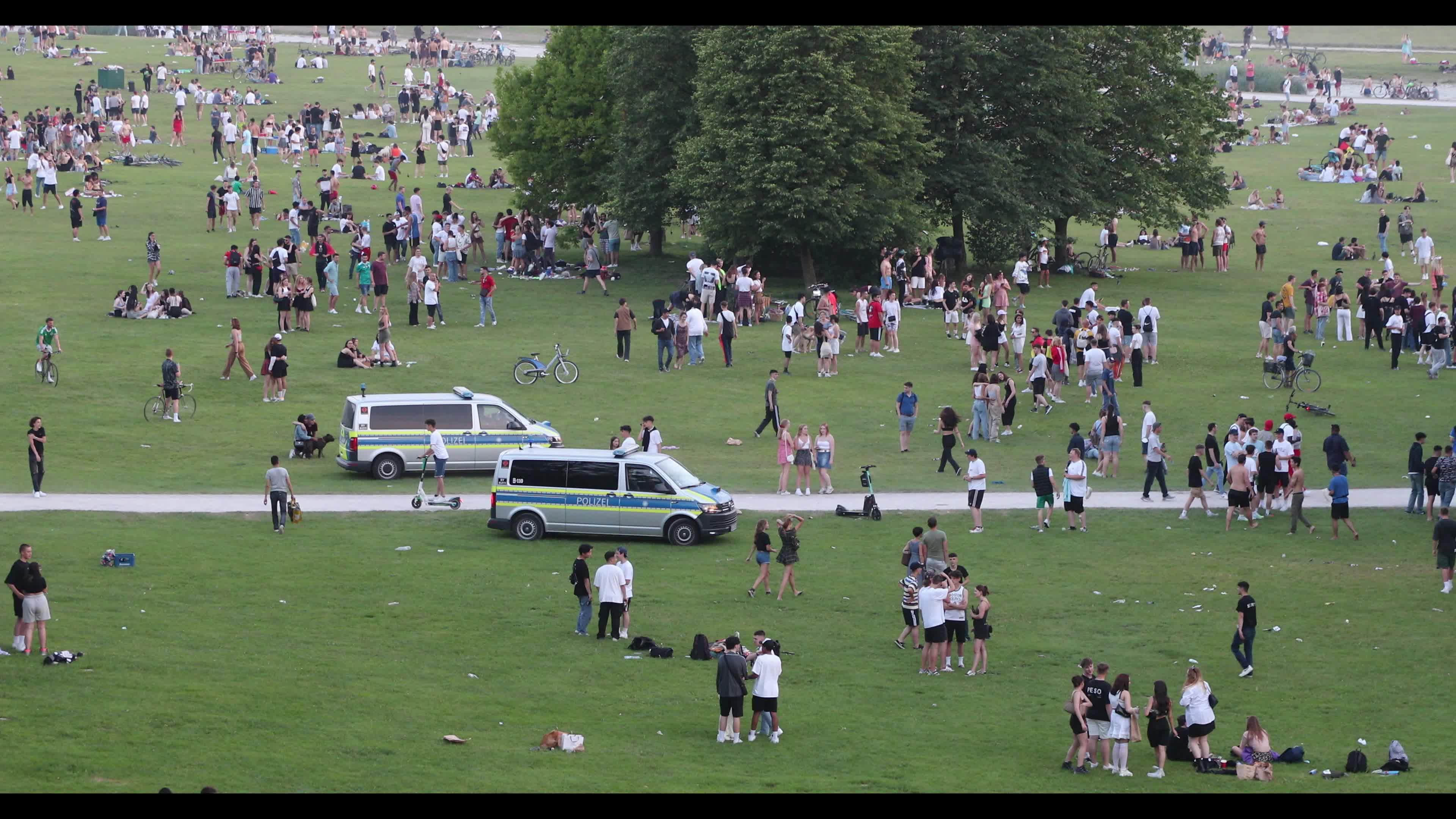 People at Englischer Garten park in Munich, Germany
