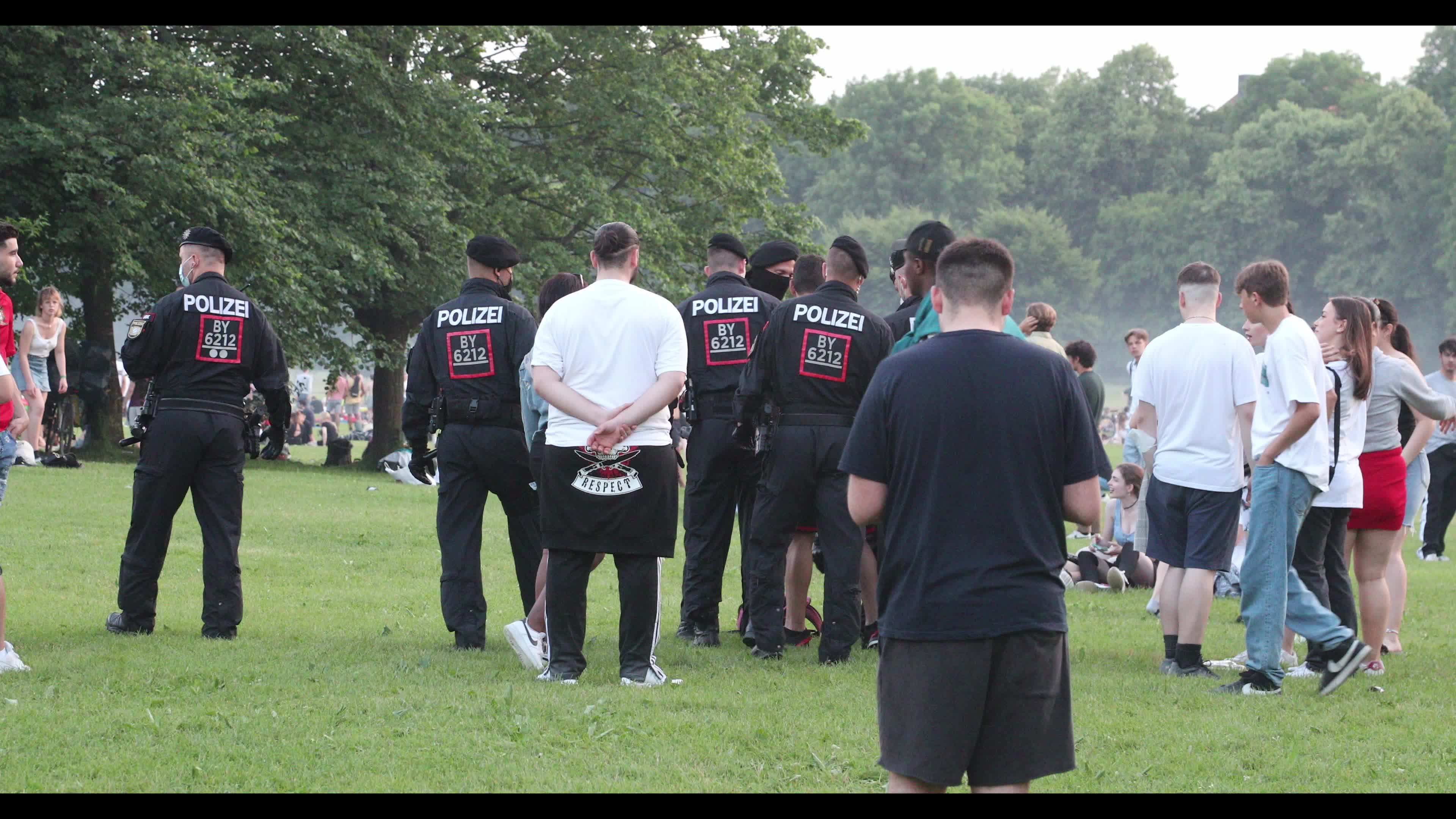 People at Englischer Garten park in Munich, Germany