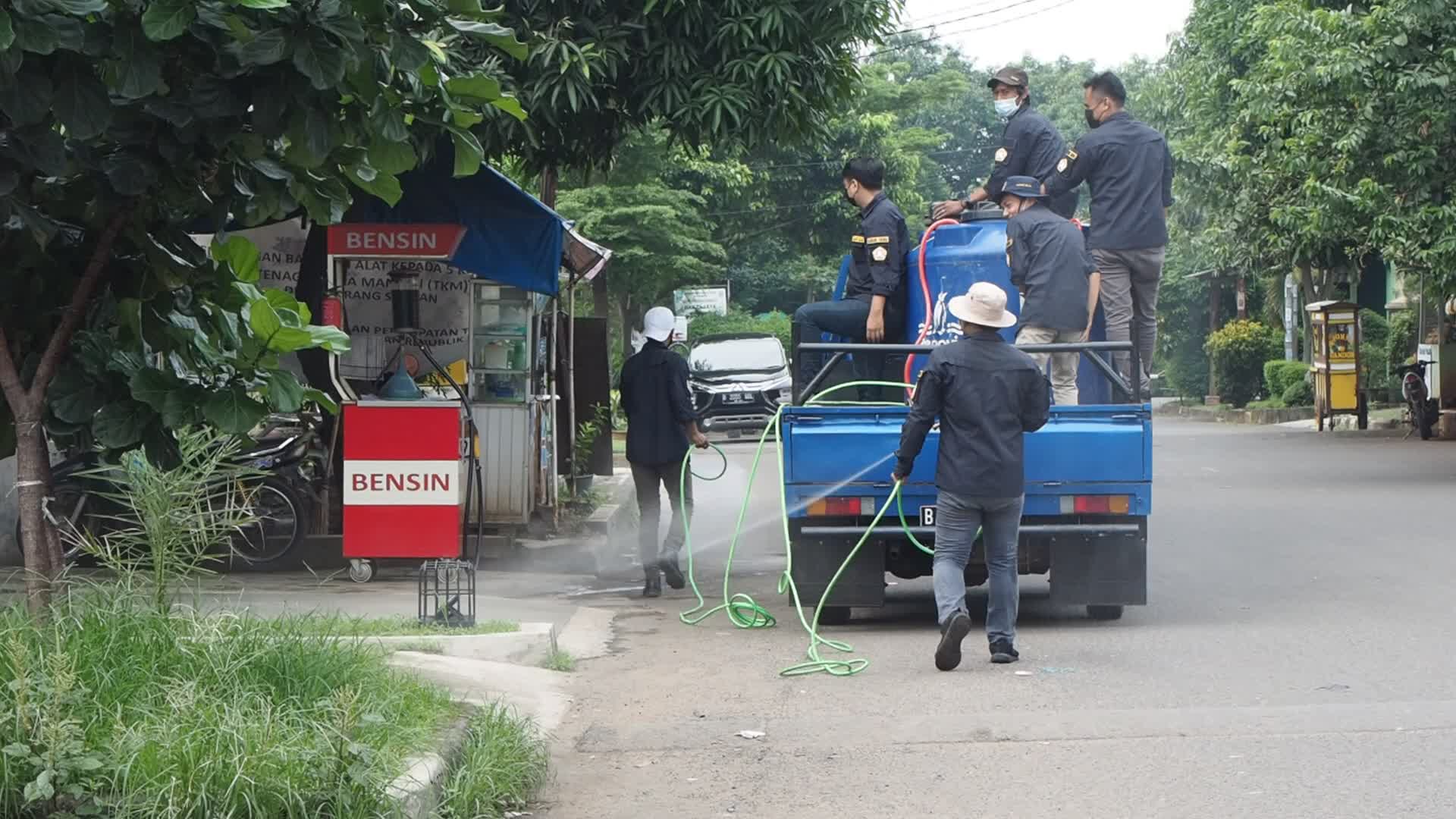 Officers Spray Disinfectant To Prevent The spread of COVID-19