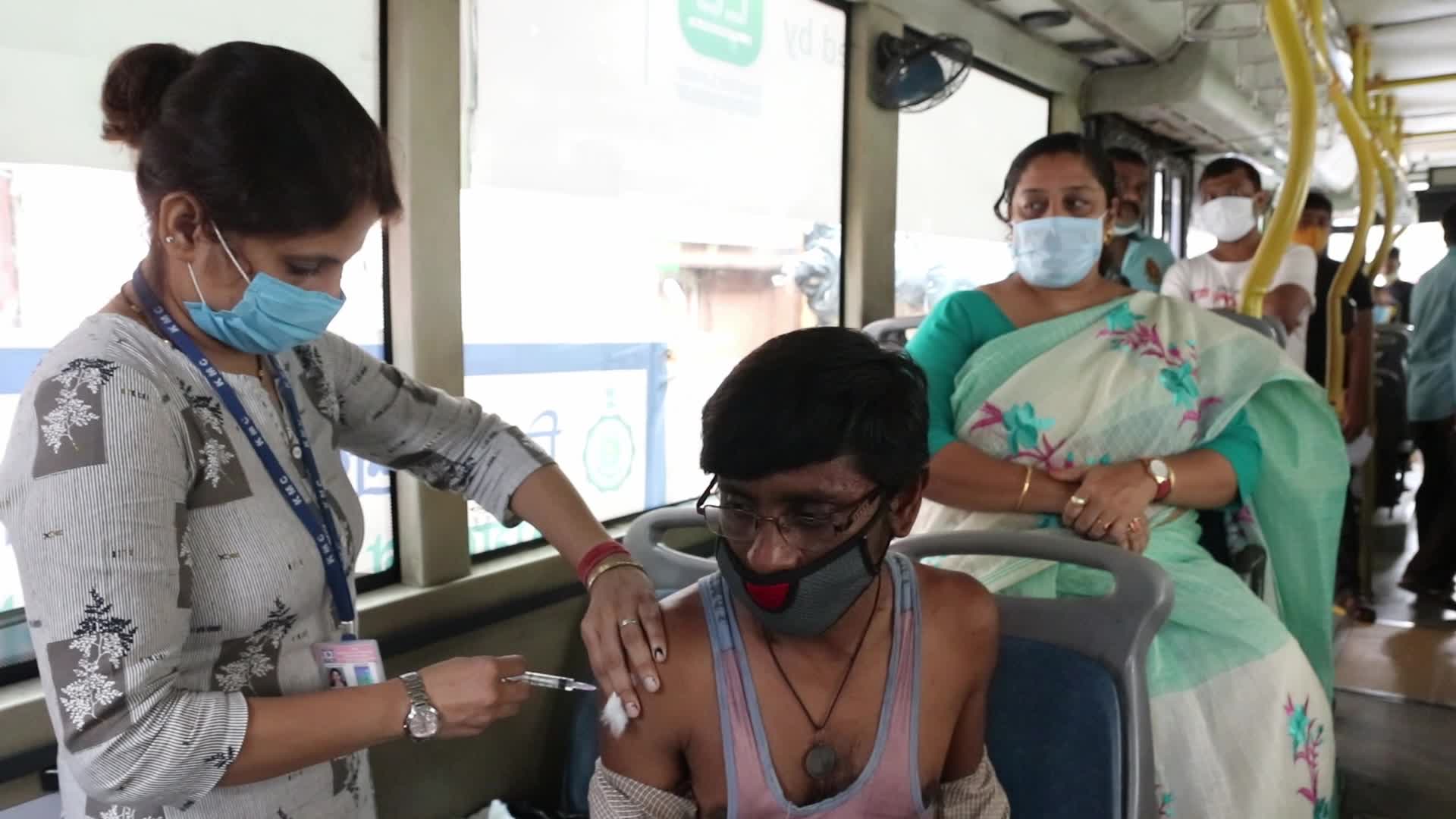 Coronavirus vaccination in a bus in India