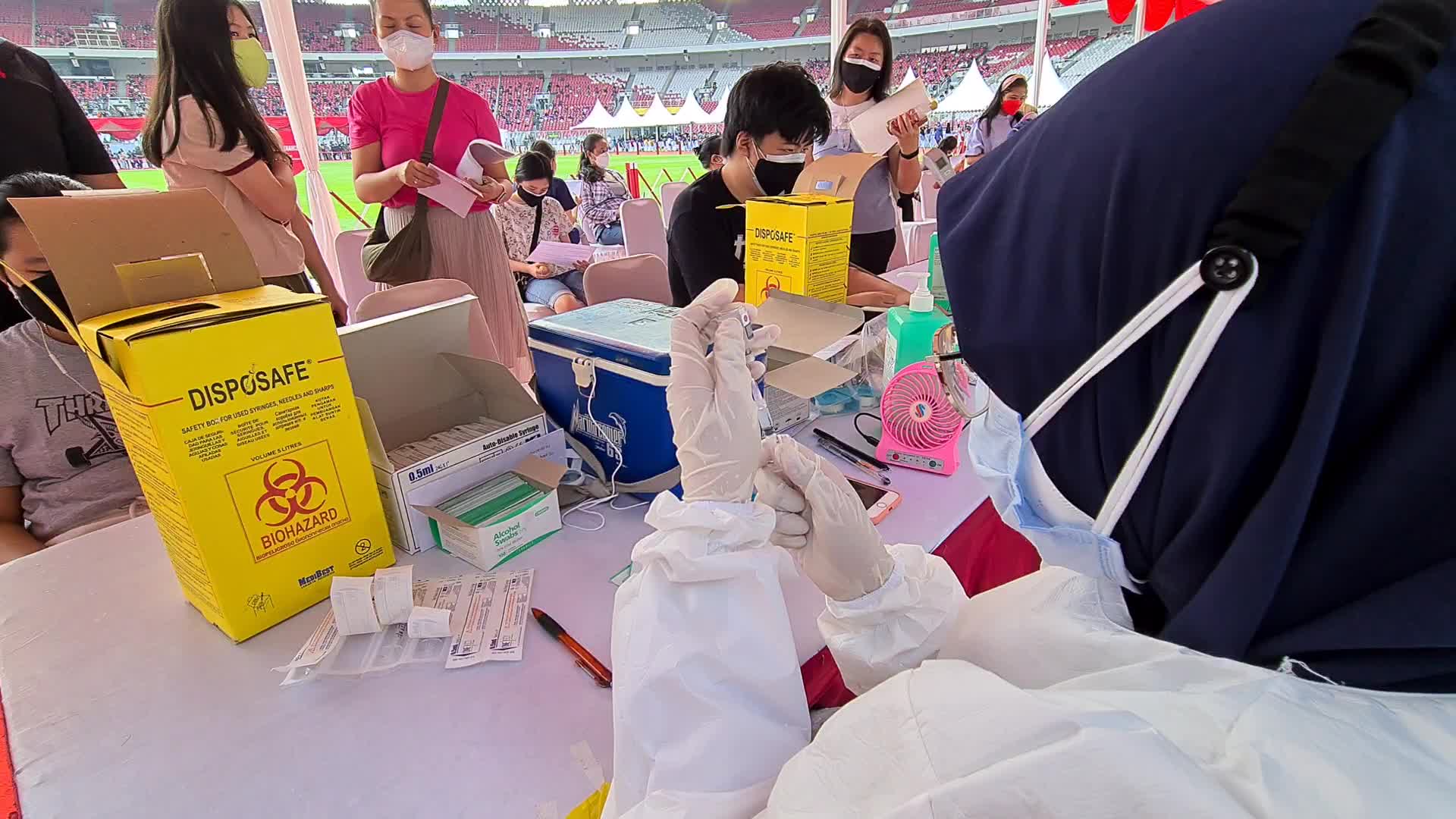 Mass Coronavirus Vaccination In Indonesia