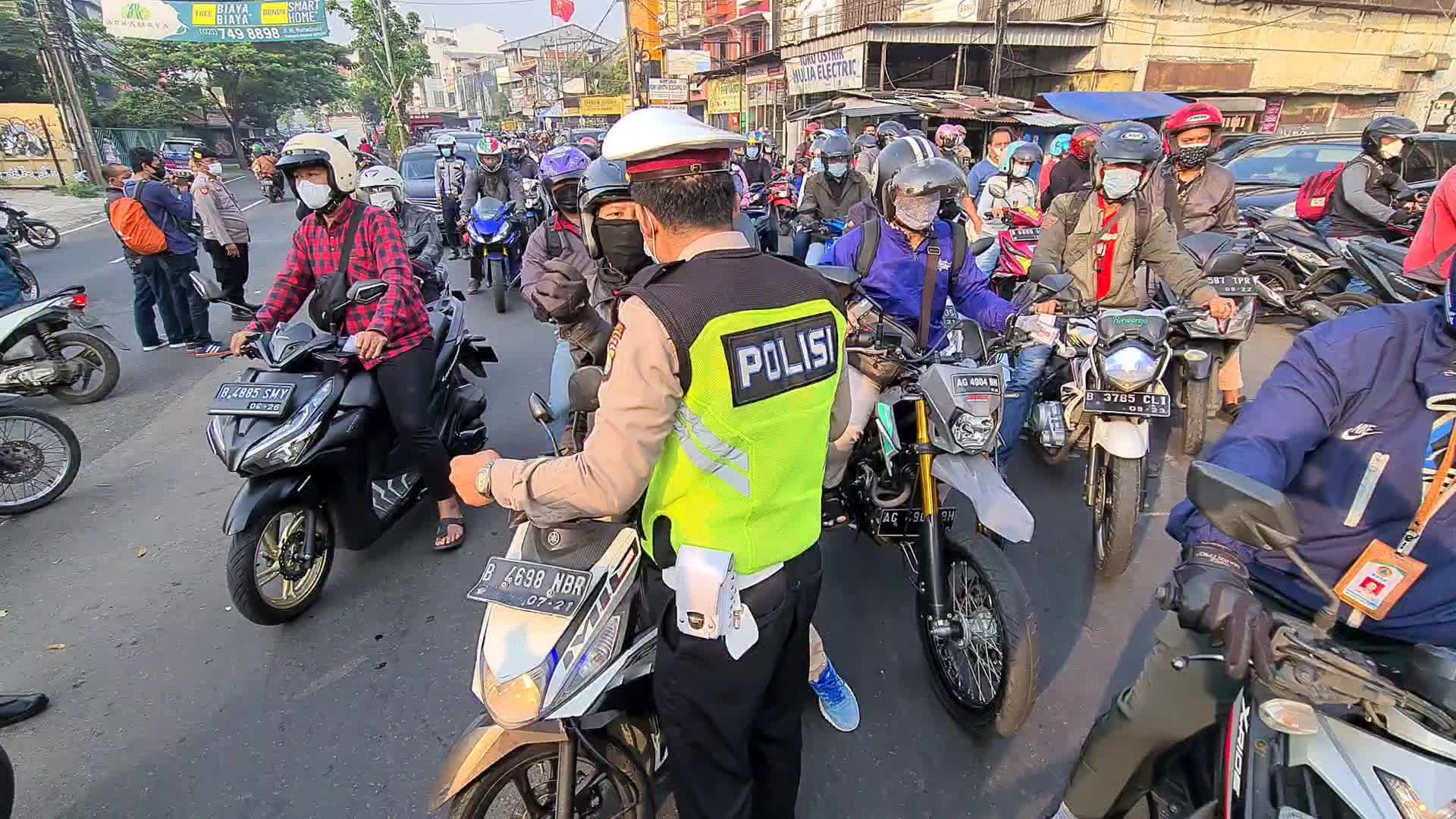 Road Blocking in implementing restrictions on emergency community activities in Indonesia