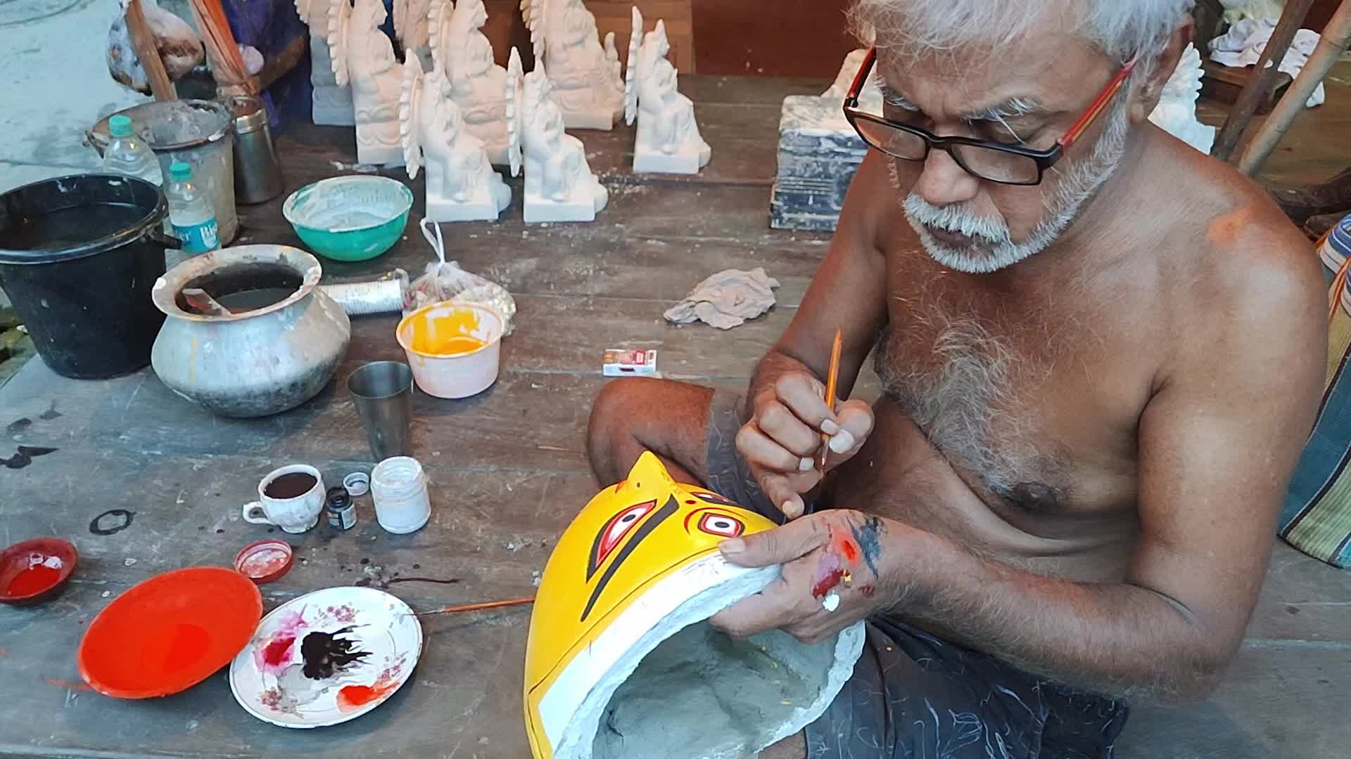 Painting Durga Idol in Kolkata, India