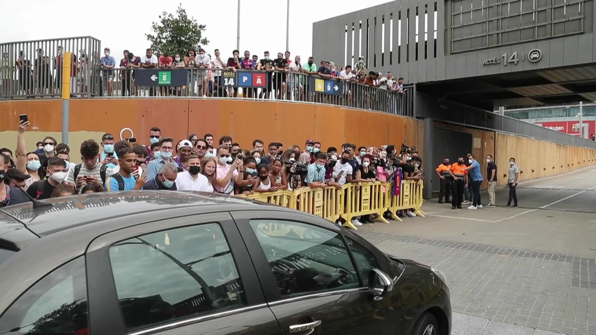 Supporters of FC Barcelona outside the stadium during the press conference of Lionel Messi