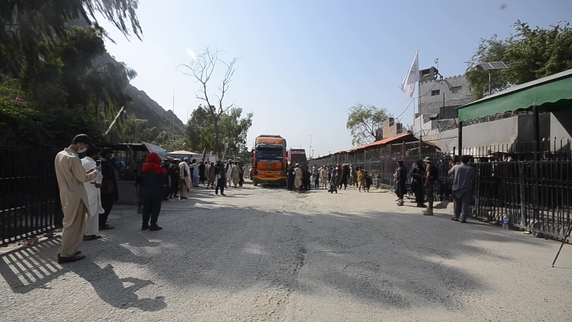 Taliban fighters and Pakistani soldiers are now guarding the Torkham crossing side-by-side