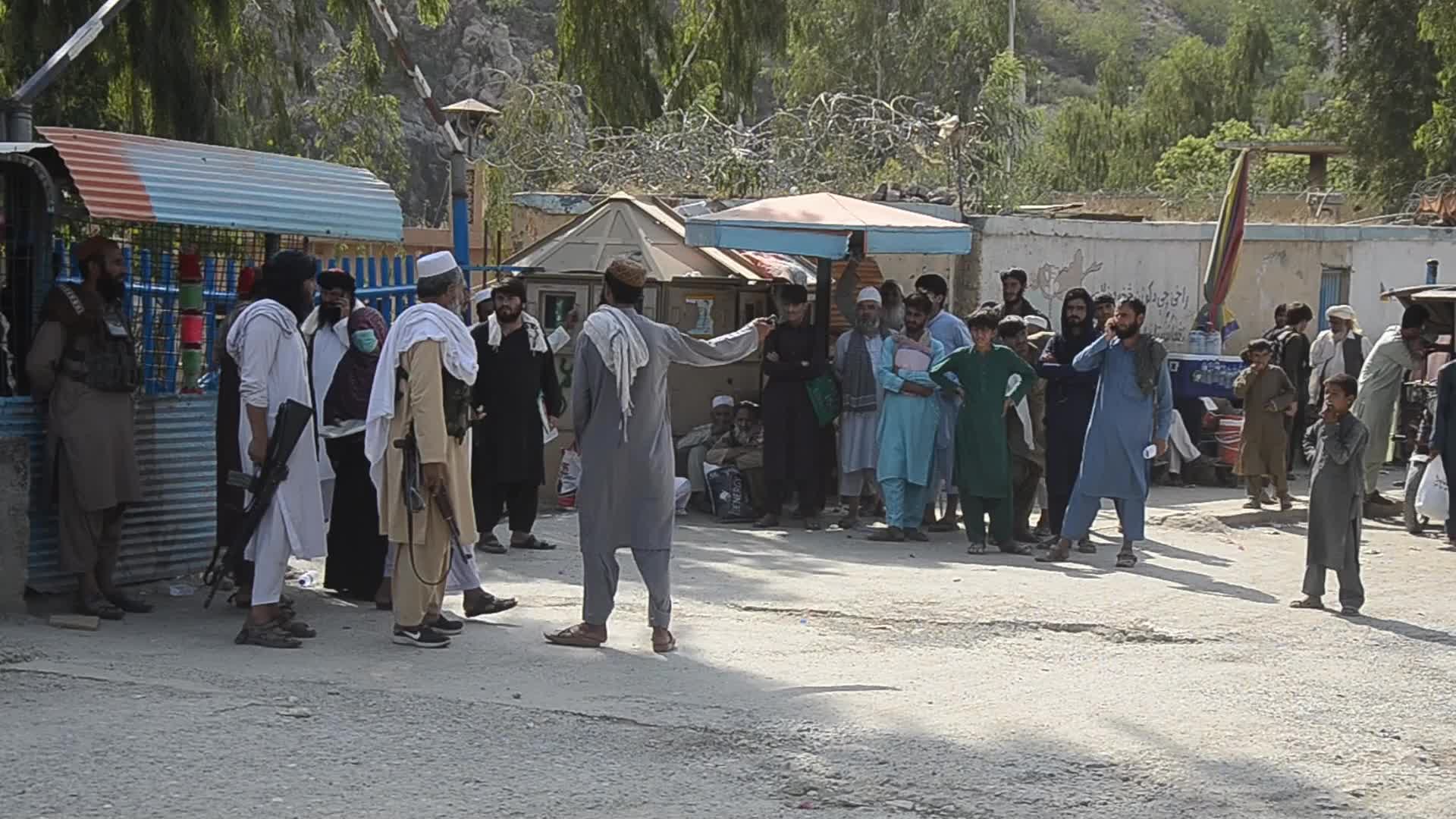 Taliban fighters and Pakistani soldiers are now guarding the Torkham crossing side-by-side