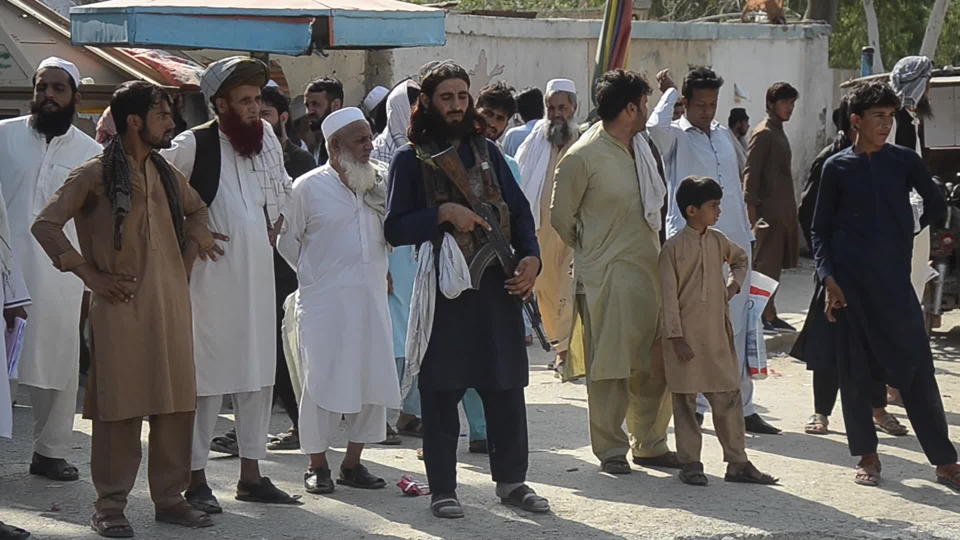 Taliban fighters and Pakistani soldiers are now guarding the Torkham crossing side-by-side