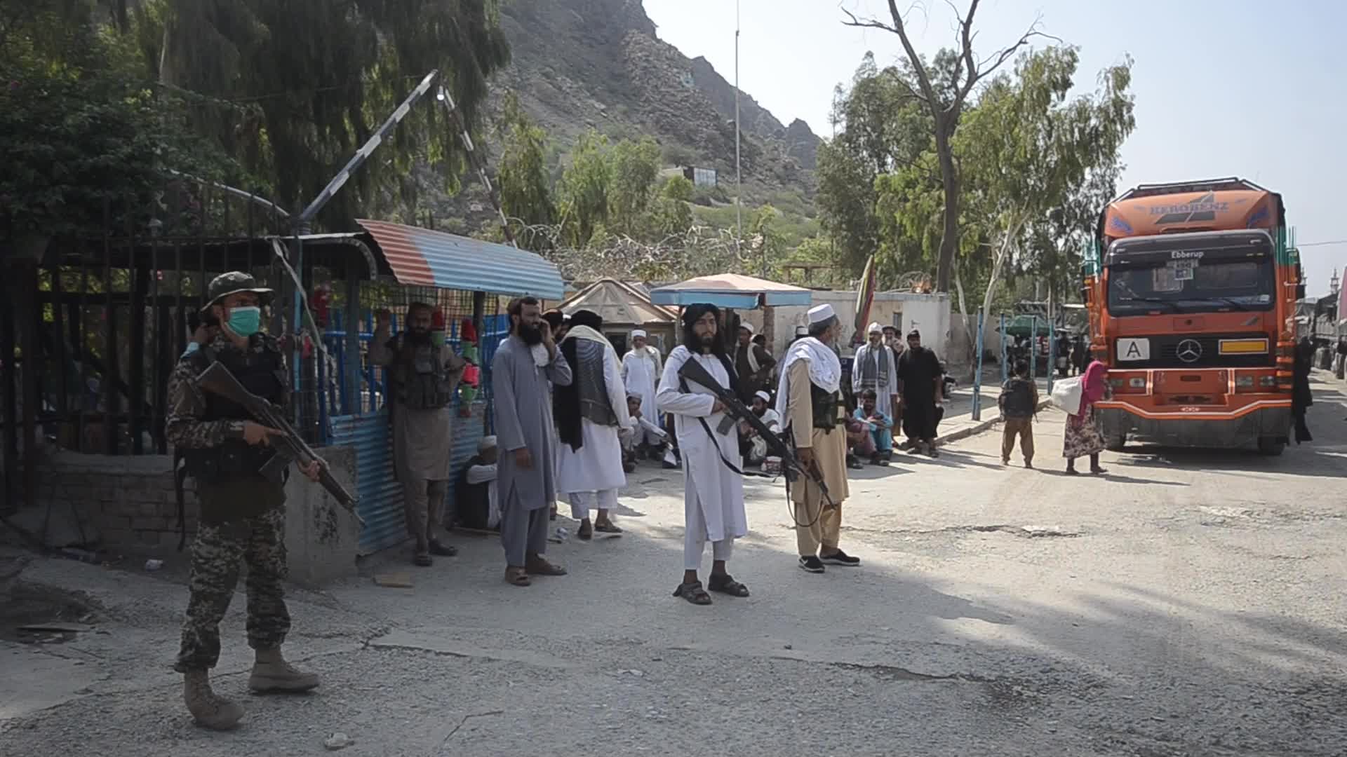 Taliban fighters and Pakistani soldiers are now guarding the Torkham crossing side-by-side