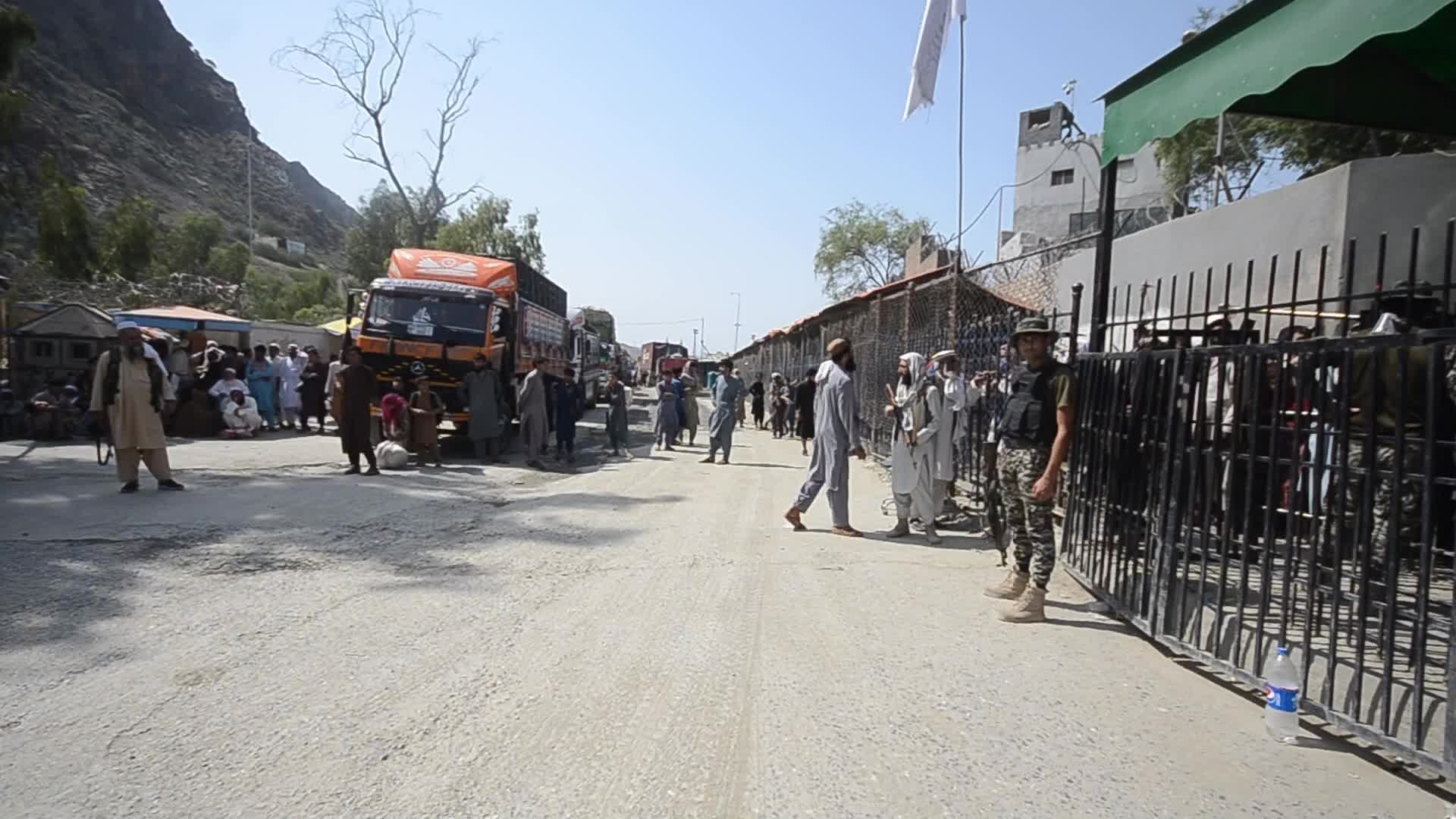 Taliban fighters and Pakistani soldiers are now guarding the Torkham crossing side-by-side